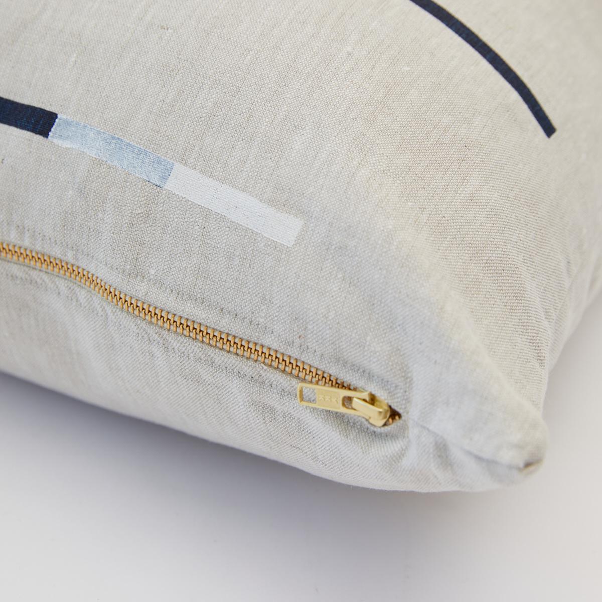 This pillow features Overlapping Dashes by Caroline Z Hurleywith a knife edge finish. Designed by Caroline Z Hurley in her Brooklyn studio and block-printed in New Bedford, Massachusetts. Each shape is cut and individually stamped onto the linen by