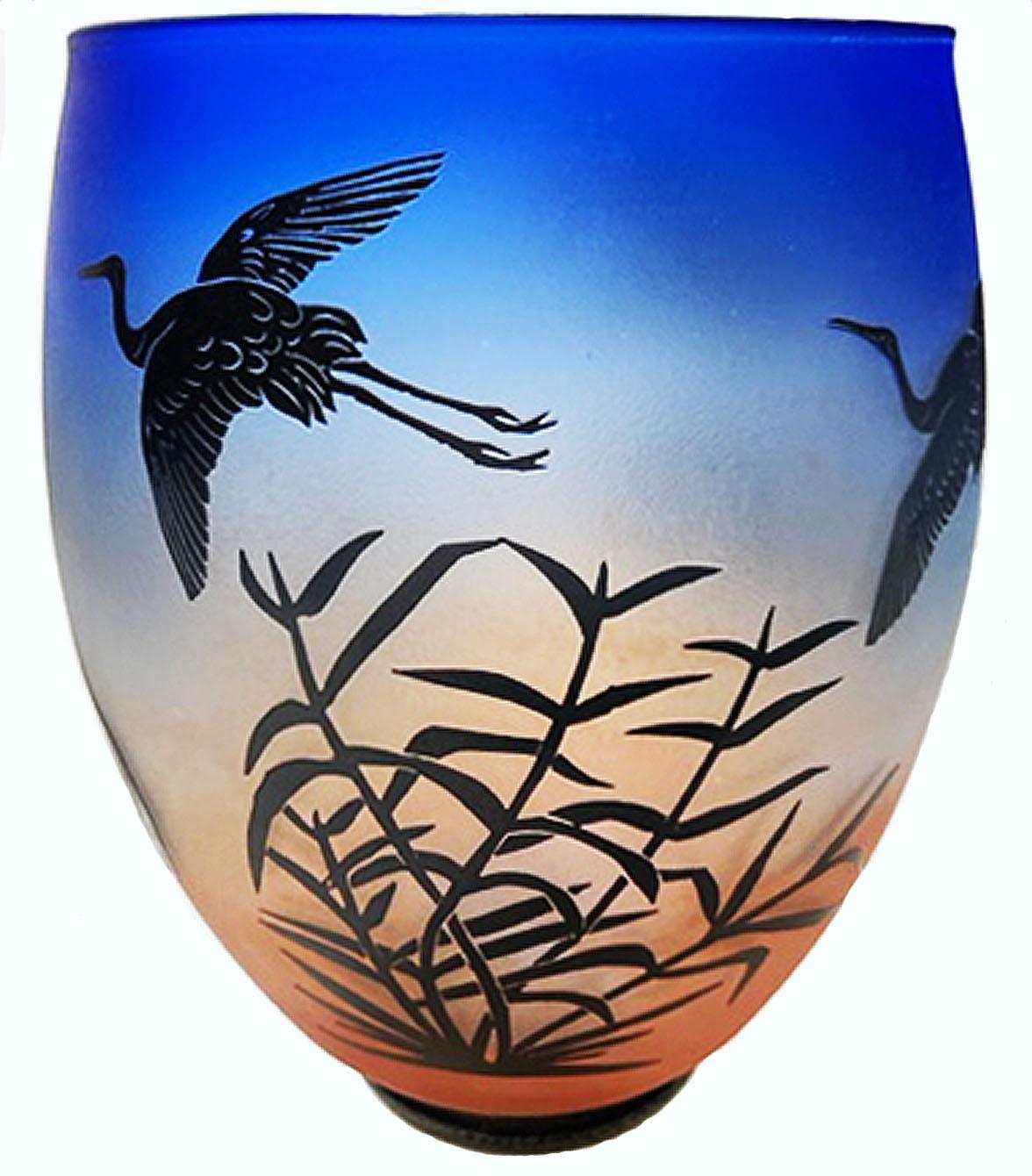This piece is overlay blown and cameo etched glass. It is one of three remaining piece in a completed limited series. The series was originally designed and sold through Artful Home catalog in 2010 and continued from there to artfair market. The