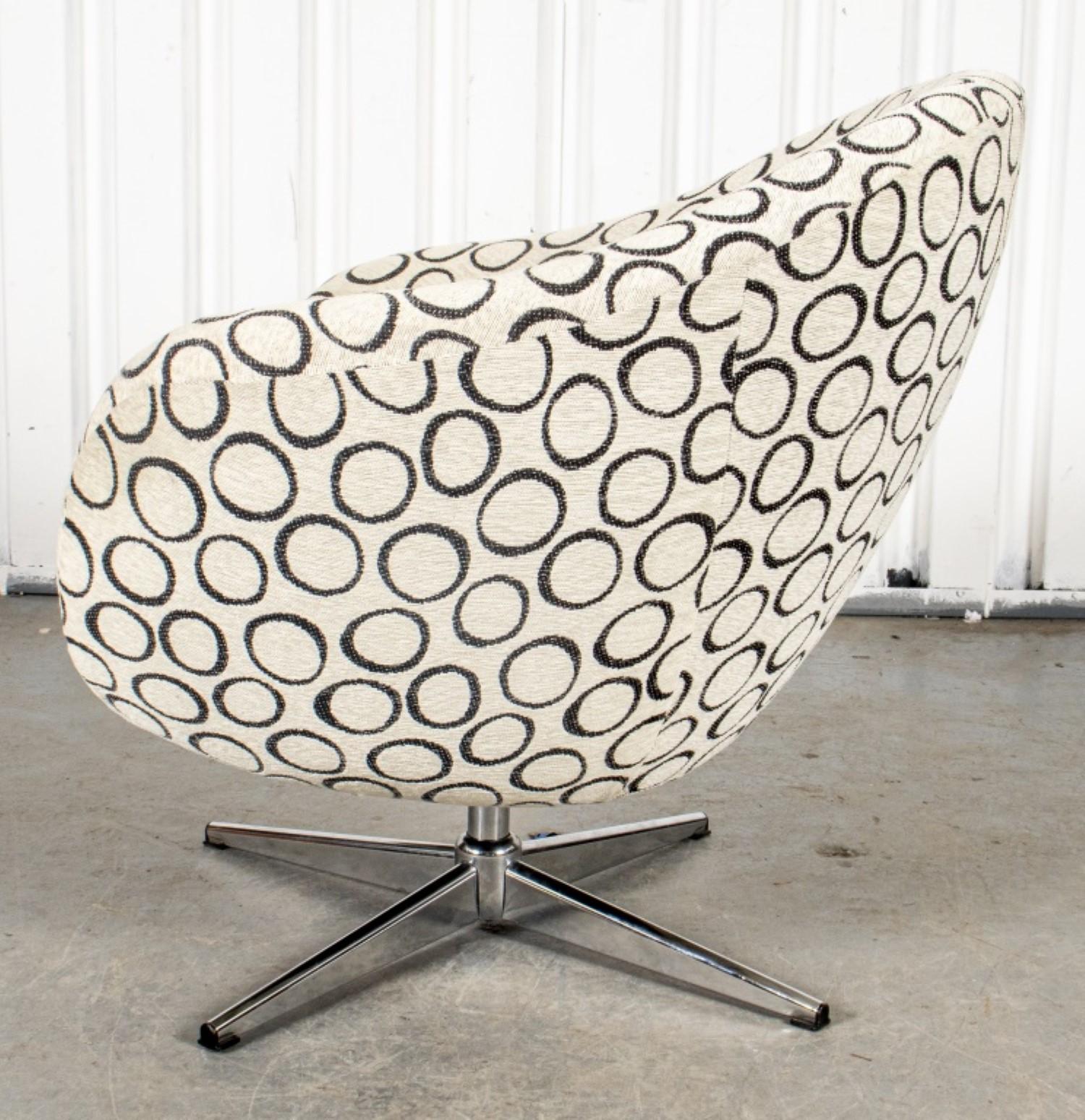 Overman Mid-Century Modern swivel lounge chair with abstract circle upholstery.

Dimensions: 29 inches high, 33 inches wide, and 29 inches deep.
Seat height: 16 inches.