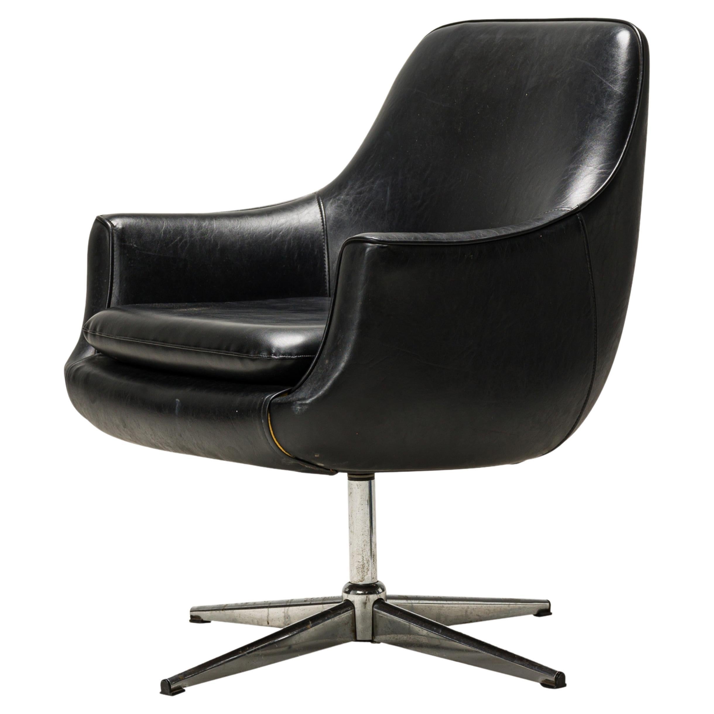 Overman Swedish Black Leather and Chrome Swivel Armchair For Sale