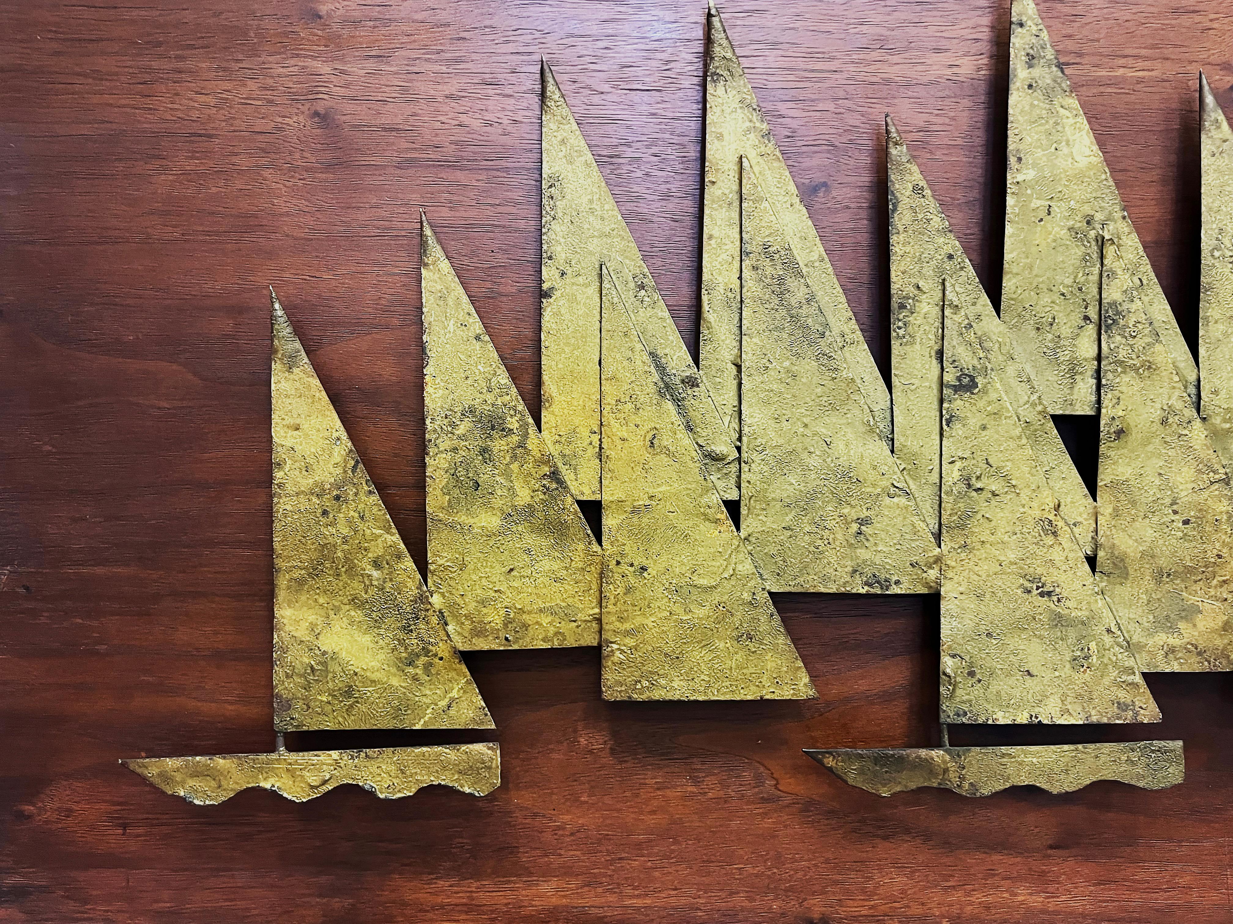  Overscale 1960s Peter Pepper Brass Sail Boats Wall Sculpture on Wood


Offered for sale is a large 5 foot long Mid-century Modern Peter Pepper wall sculpture with brass sail boats mounted on a wood panel.  The composition of the sailboats is a