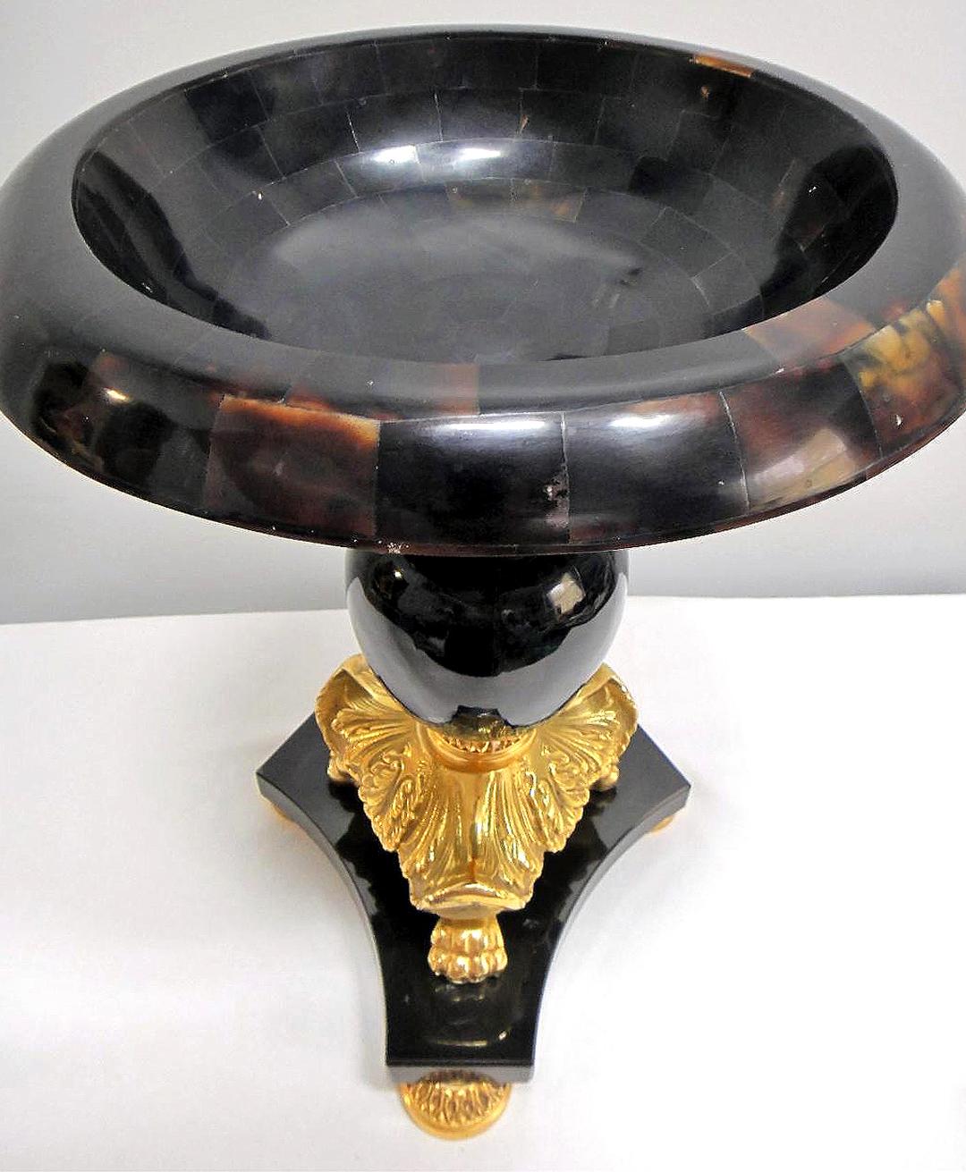 Laudarte Srl Oversale Marble, Bronze and Horn Urn, Italy

Offered for sale is a stately marble and bronze urn with a tessellated Horn top by Laudarte Srl. The urn is finely crafted with inset marble details on the underside. Laudarte designs and