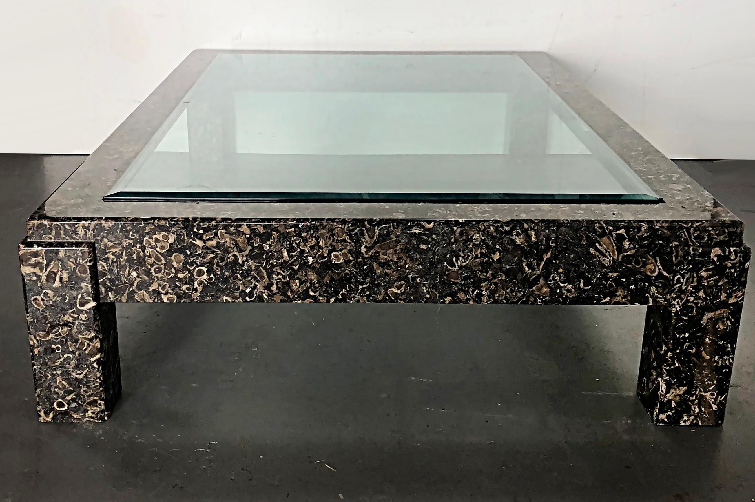 Overscale marble coffee table with inset glass top.

Offered for sale is an overscale marble coffee table with an inset glass top. This substantial table is a recent acquisition from a multi-million dollar Miami Beach La Gorce Island home. The