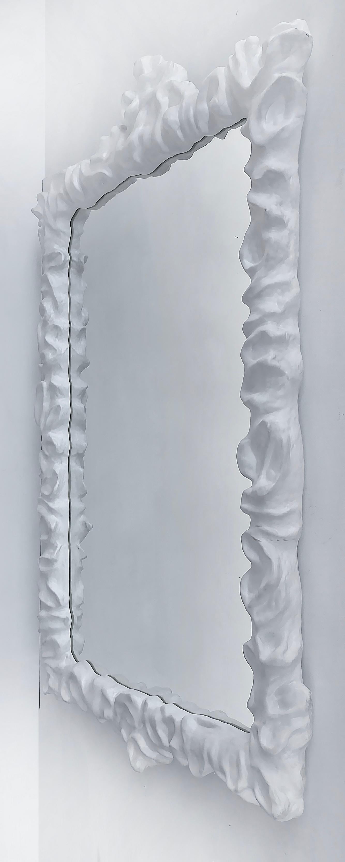 Overscale Oly Studios cast resin klemm mirror in a plaster finish.

Offered for sale is the Klemm mirror in cast resin by Oly Studios. Oly makes contemporary decor objects that are durable and transitional in their designs. The mirror has the look