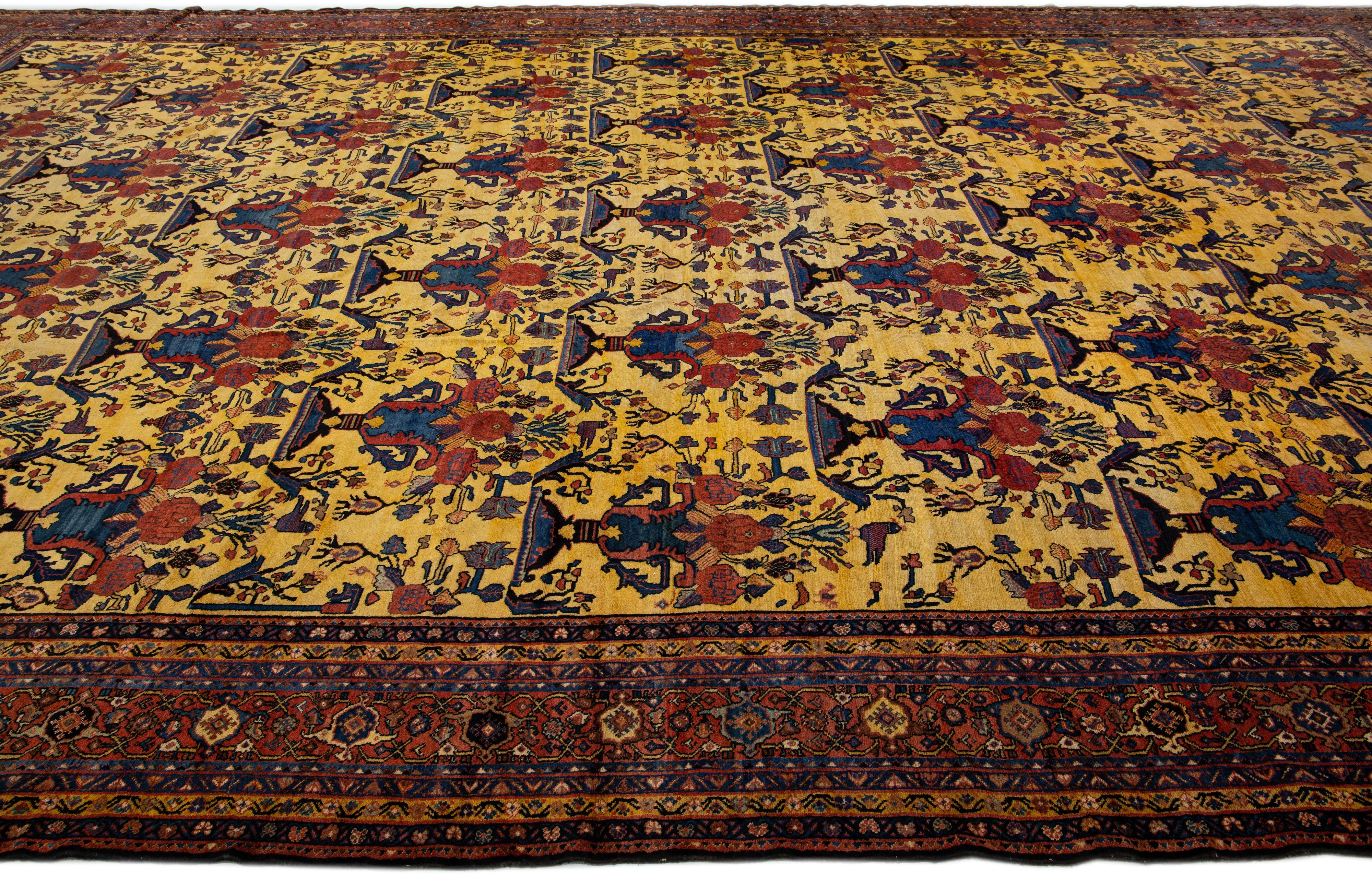 Oversize Antique Bakhtiari Persian Handmade Yellow Wool Rug with Allover Motif In Good Condition For Sale In Norwalk, CT