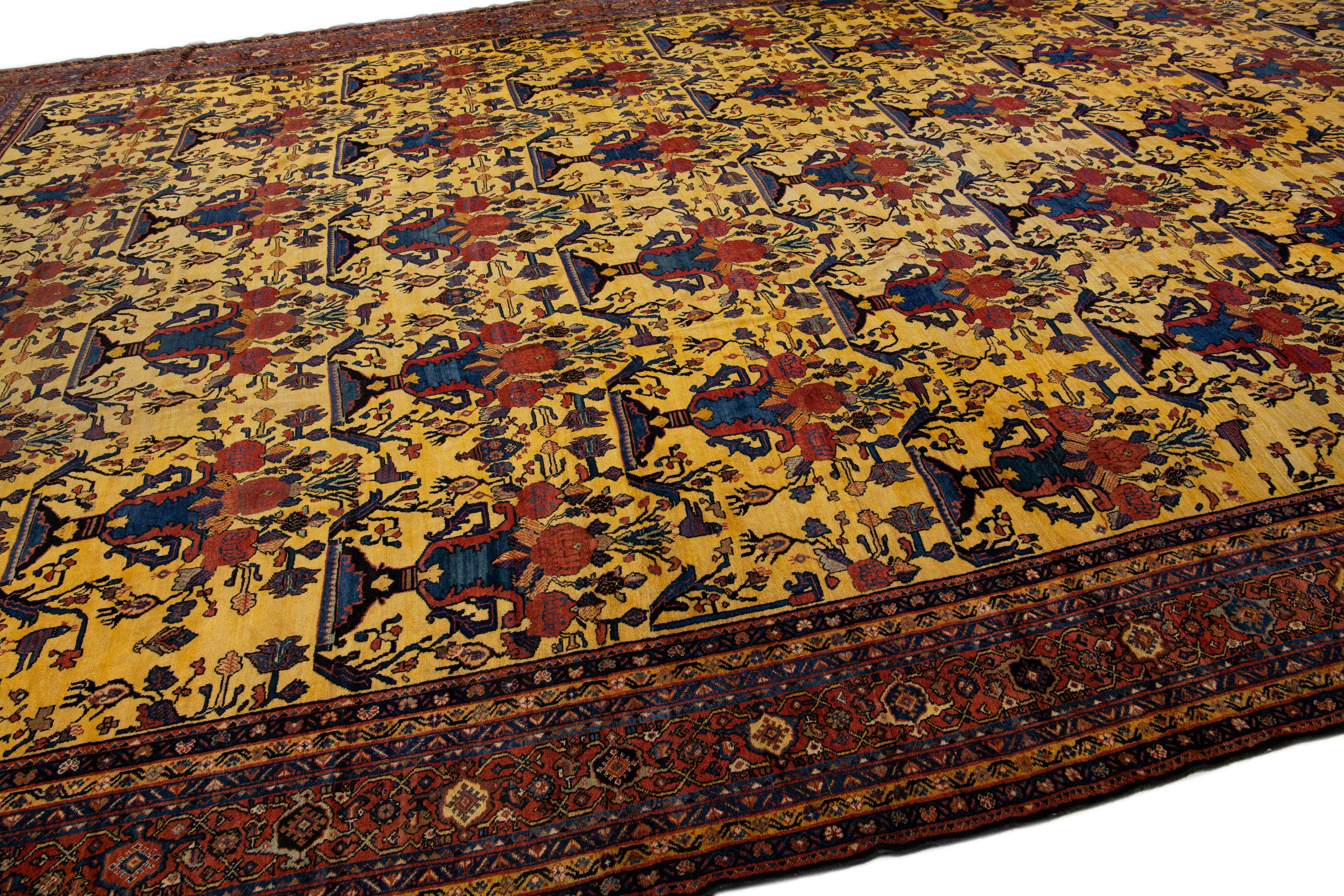 20th Century Oversize Antique Bakhtiari Persian Handmade Yellow Wool Rug with Allover Motif For Sale