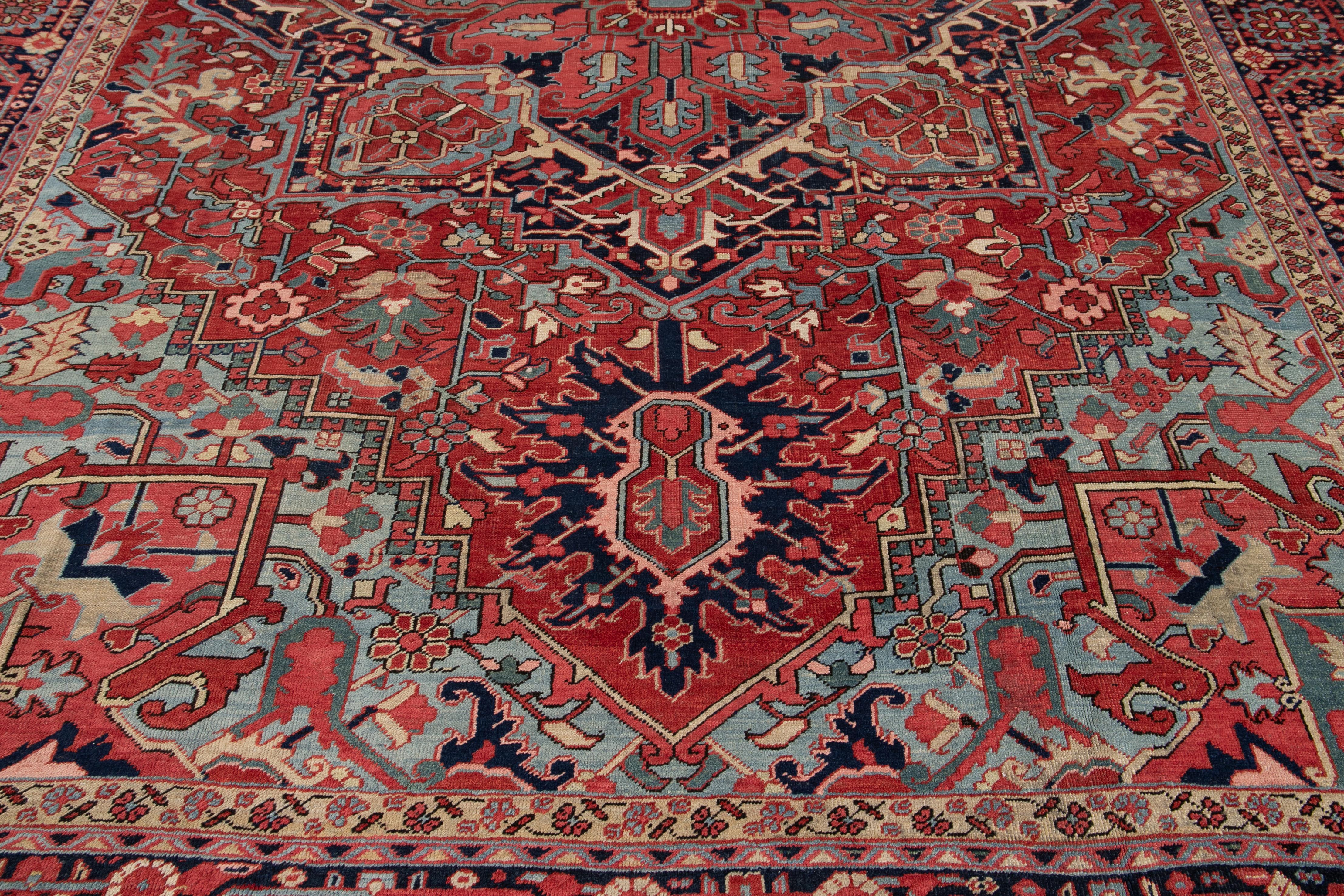 Early 20th Century Oversize Antique Heriz Handmade Red & Blue Medallion Motif Wool Rug For Sale