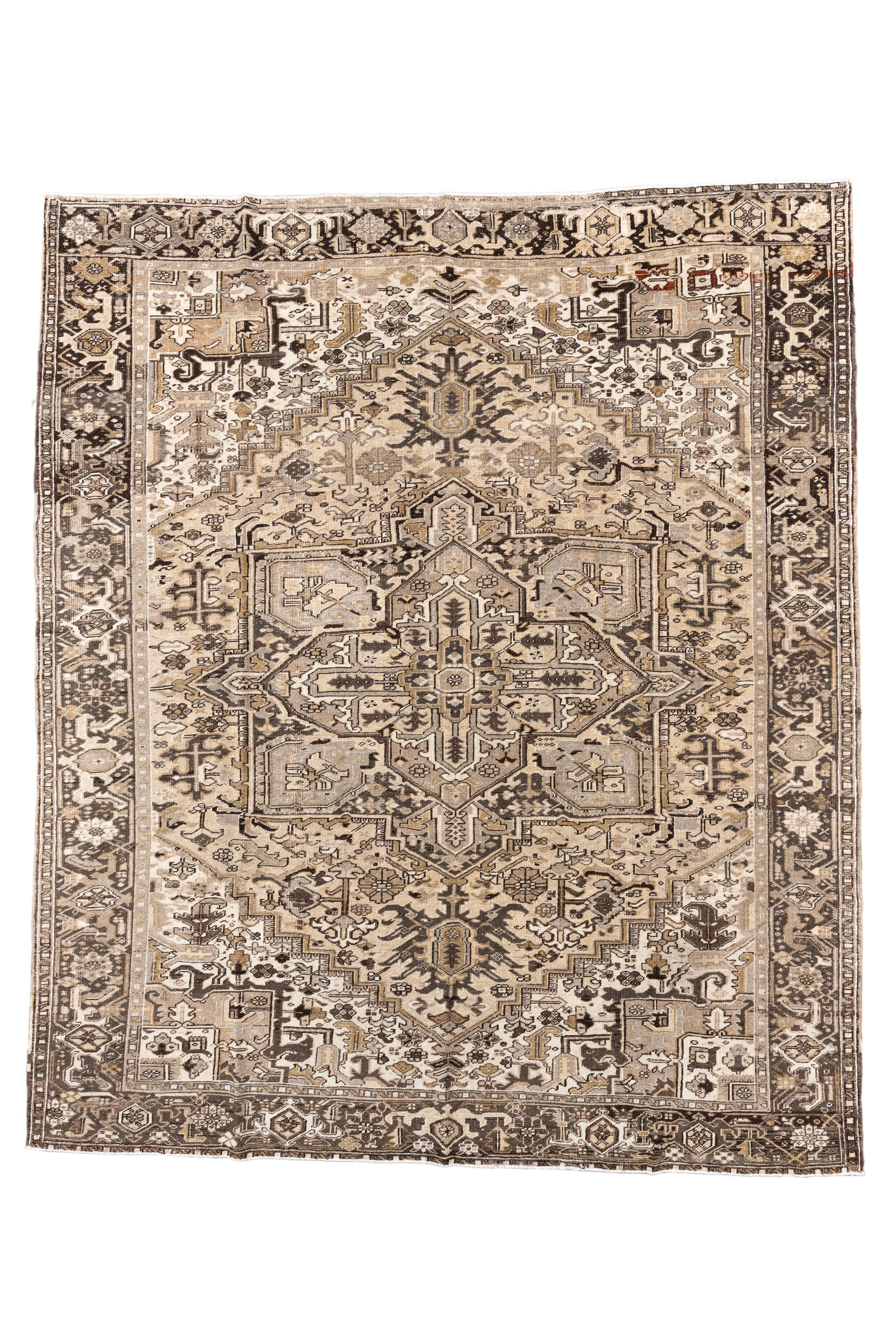 This exquisite antique Heriz rug, measuring 9'0