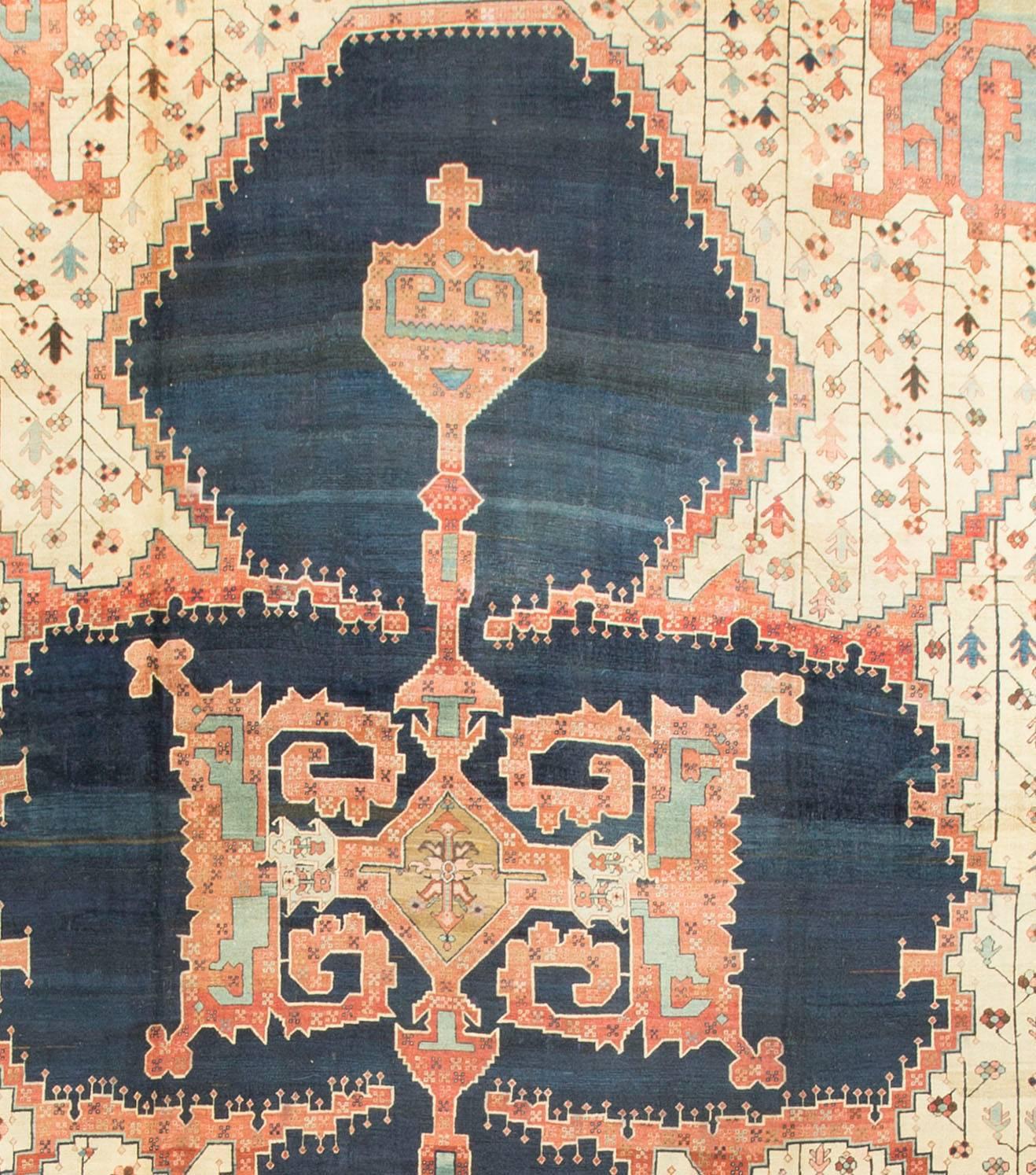 Oversize Antique Heriz Serapi Rug, circa 1890  15'10 x 20'. The small town of Heriz in North West Persia is the centre of one of the most important weaving areas in Azerbaijan and has given its name to one of the most distinctive styles with its