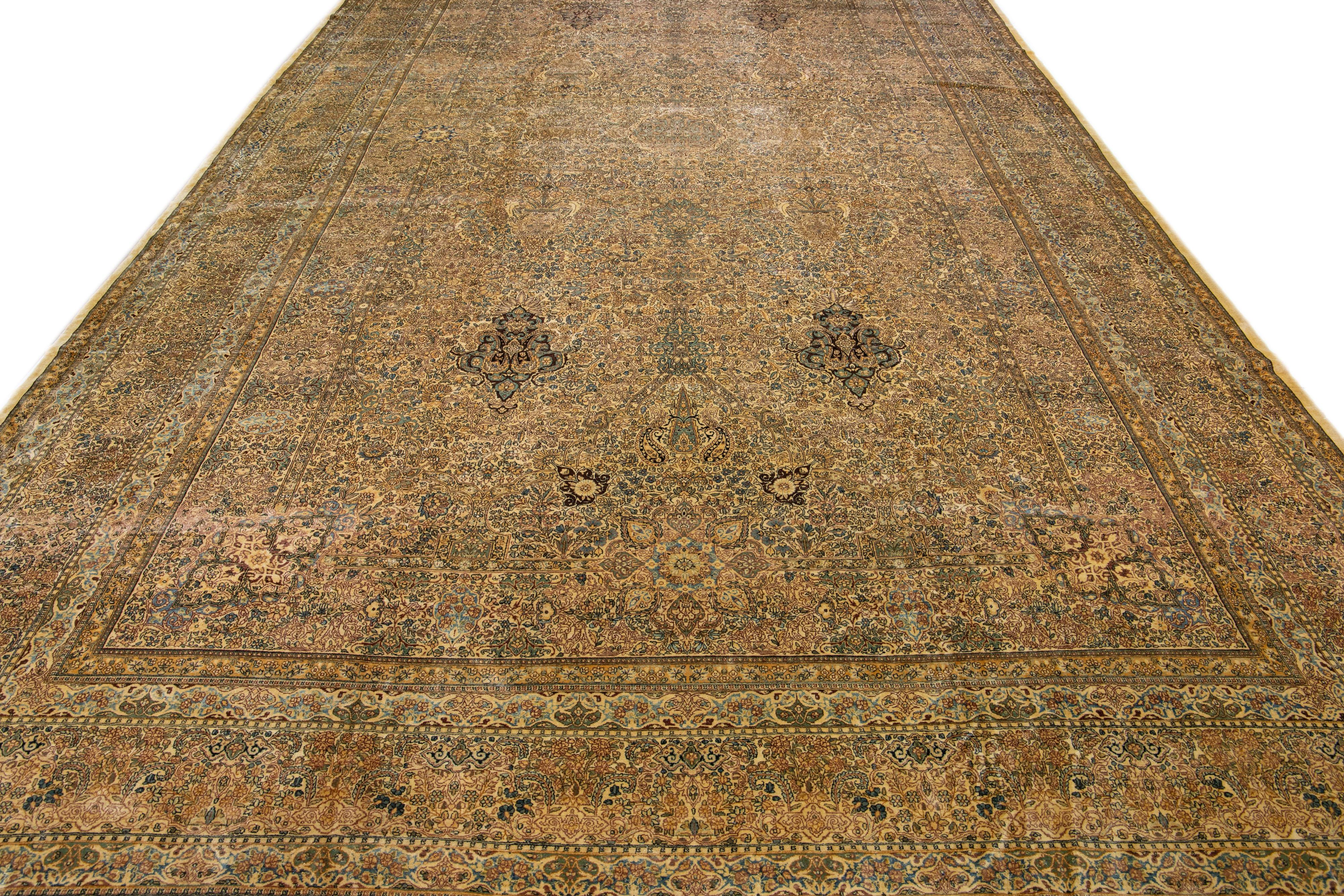 Kirman Oversize Antique Kerman Handmade Beige Persian Wool Rug with Allover Pattern For Sale