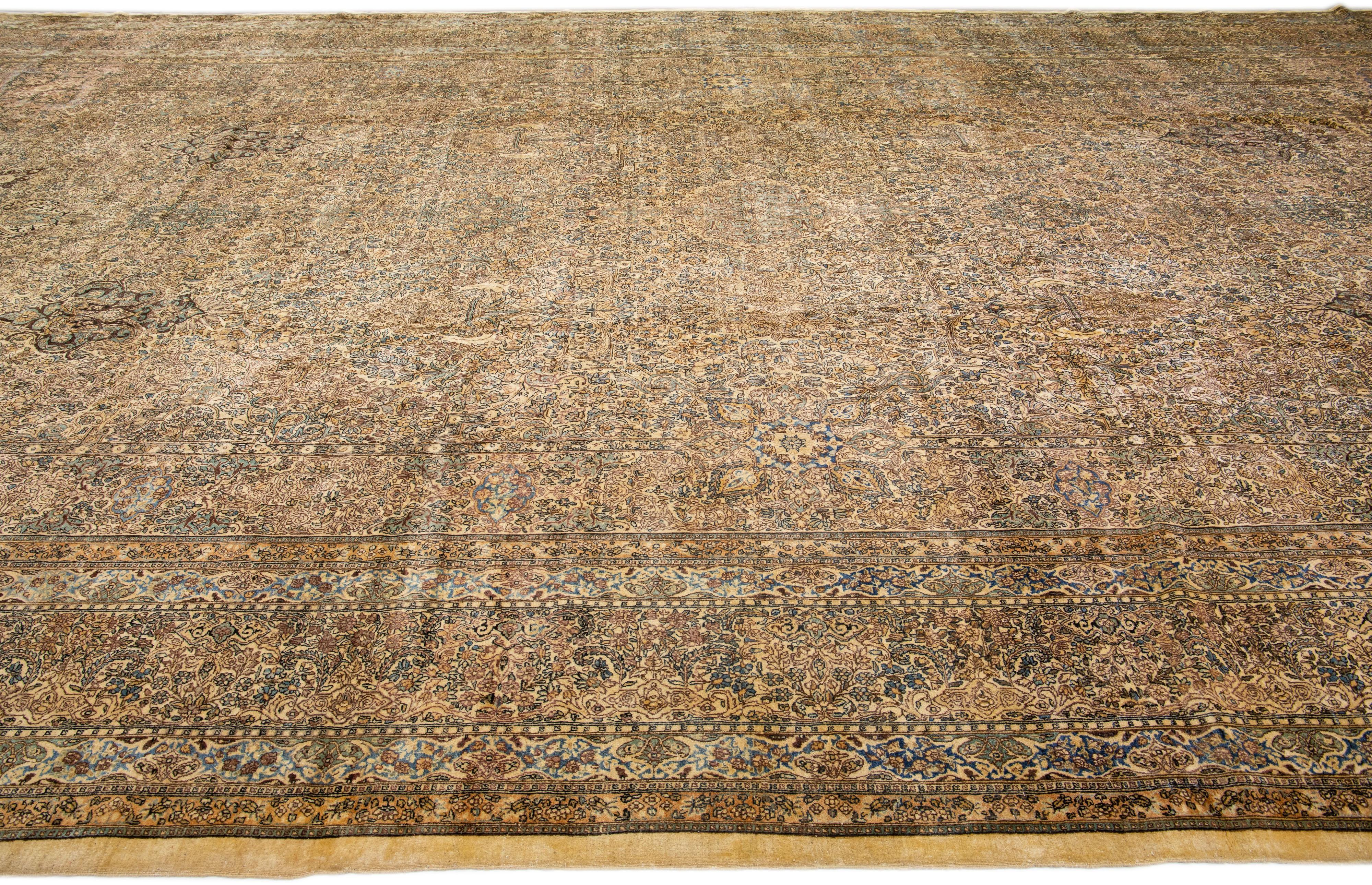 Oversize Antique Kerman Handmade Beige Persian Wool Rug with Allover Pattern In Good Condition For Sale In Norwalk, CT