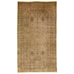 Tappeto di lana persiano antico Kerman fatto a mano di colore beige con motivo alllover