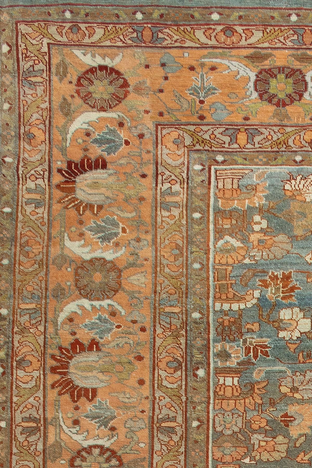 An early 20th century Persian Malayer oversize rug with an all-over floral repetitive design 

Measures: 14'4'' x 18'1''.