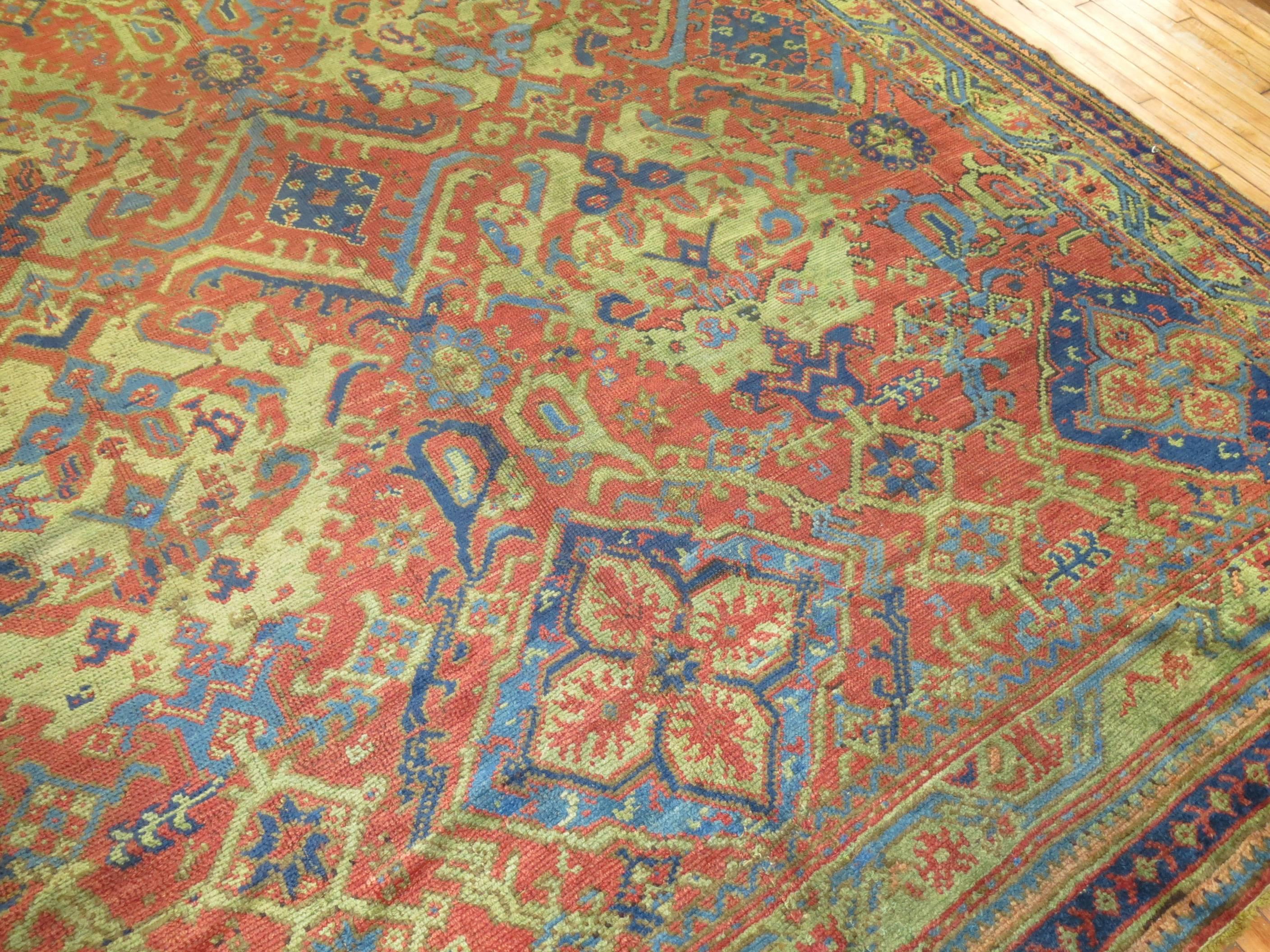 An oversize turn of the 20th century highly decorative antique Oushak rug.

10'11'' x 22'4''

 Without compromising to appeal to Western consumers, Turkish weavers from the city of oushak managed to create one of the country’s most desirable rug