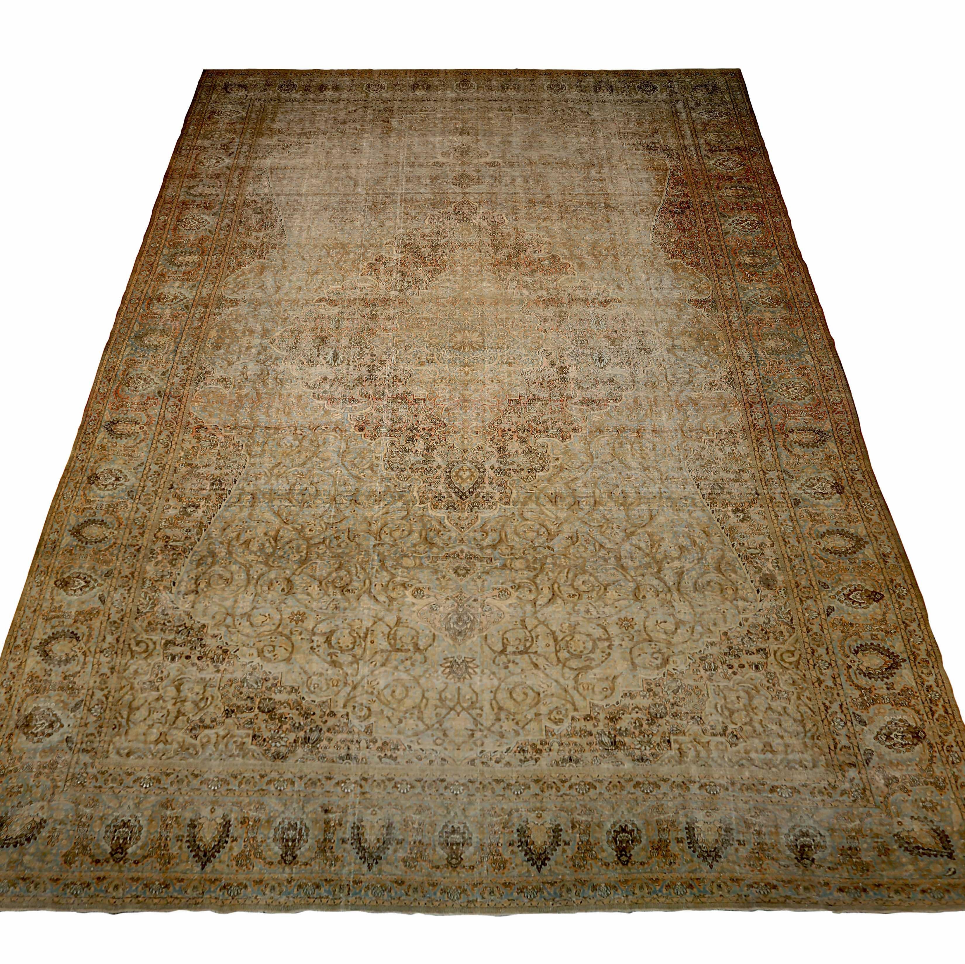 Antique Persian area rug handwoven from the finest sheep’s wool. It’s colored with all-natural vegetable dyes that are safe for humans and pets. It’s a traditional Kashan design handwoven by expert artisans. It’s a lovely area rug that can be