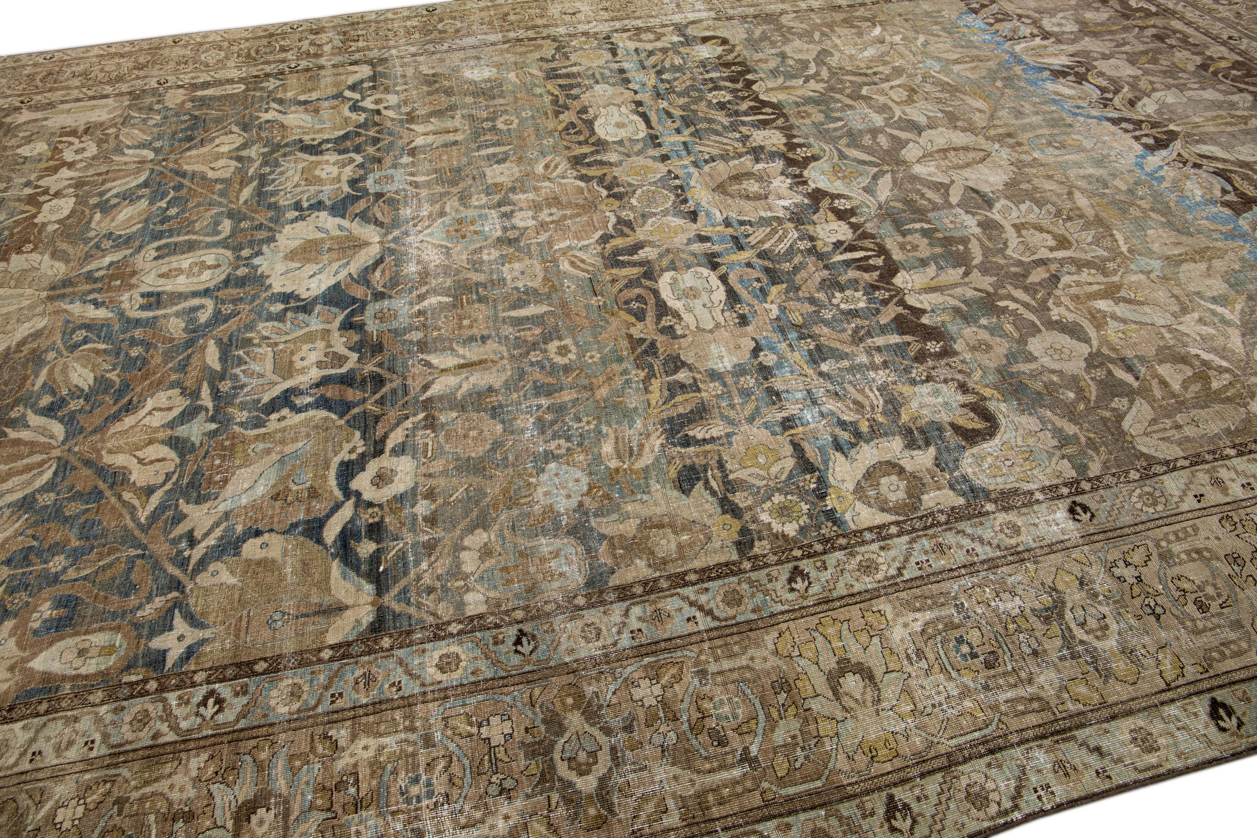 Oversize Antique Persian Heriz Handmade Floral Blue and Brown Wool Rug For Sale 4