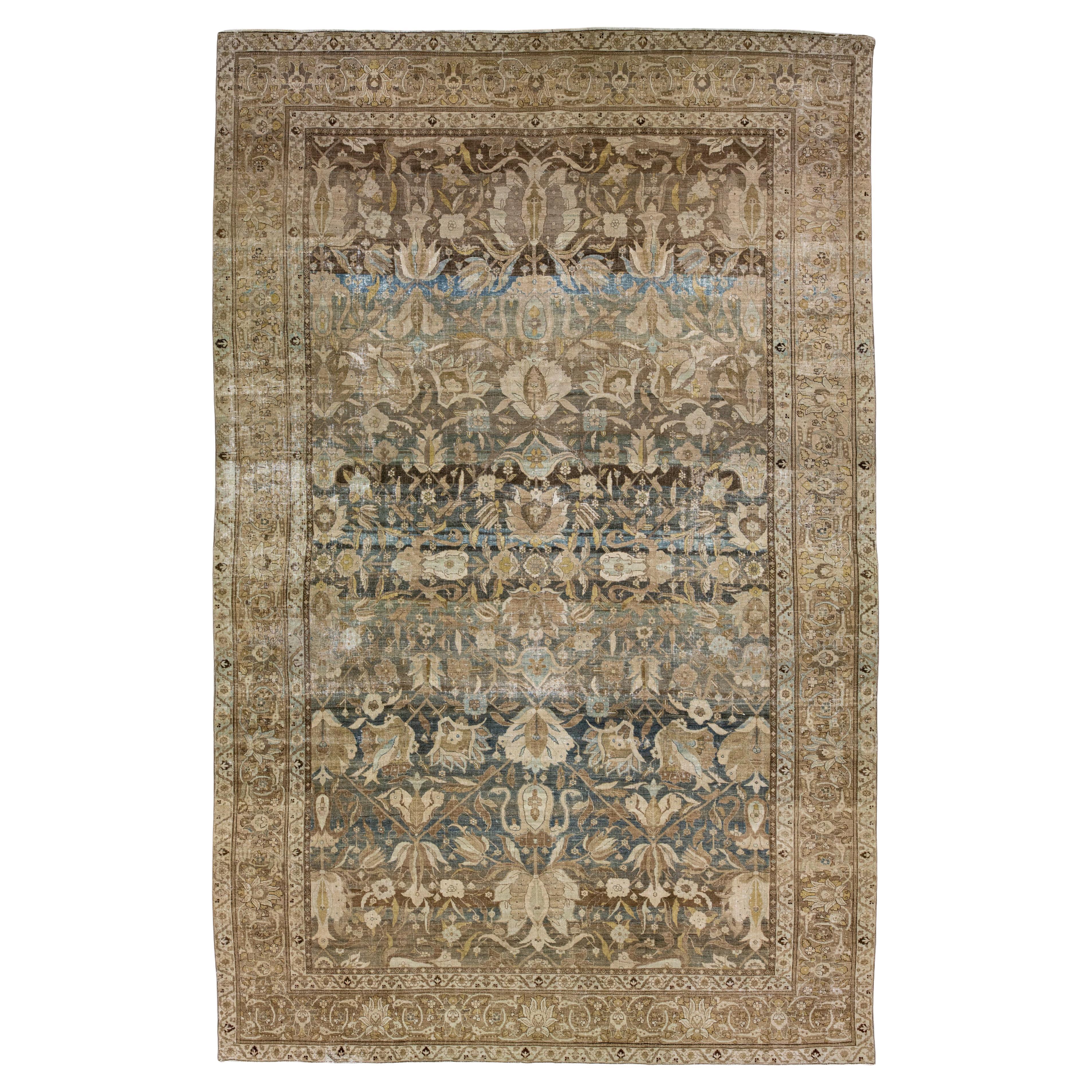 Oversize Antique Persian Heriz Handmade Floral Blue and Brown Wool Rug For Sale