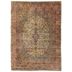 Oversize Antique Persian Ivory and Blue Floral Kirman Rug, circa 1920s