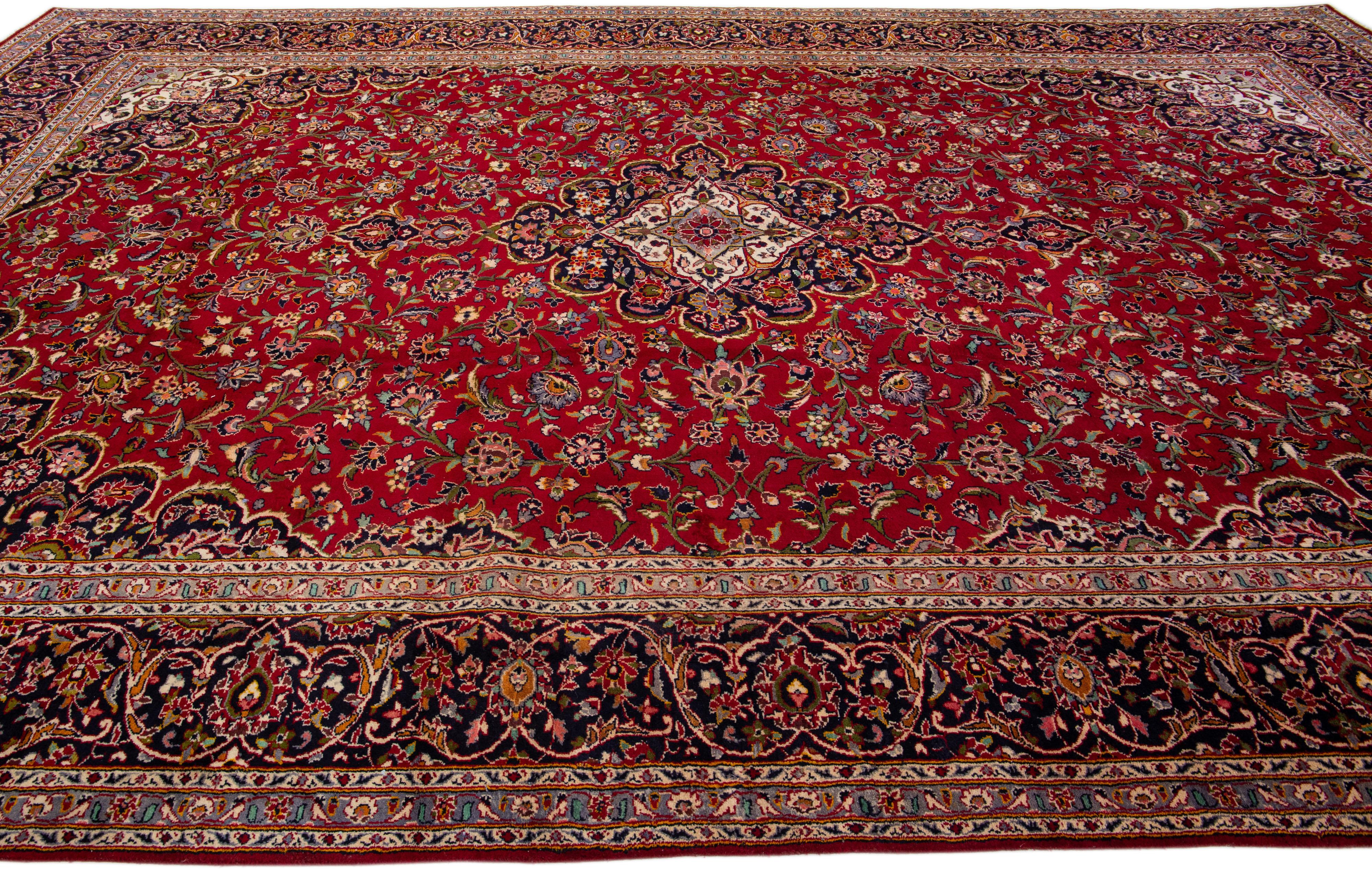 Oversize Antique Persian Kashan Handmade Medallion Wool Rug in Red In Good Condition For Sale In Norwalk, CT