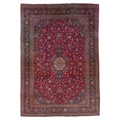 Tappeto antico oversize in lana rossa Kashan con motivo a medaglione