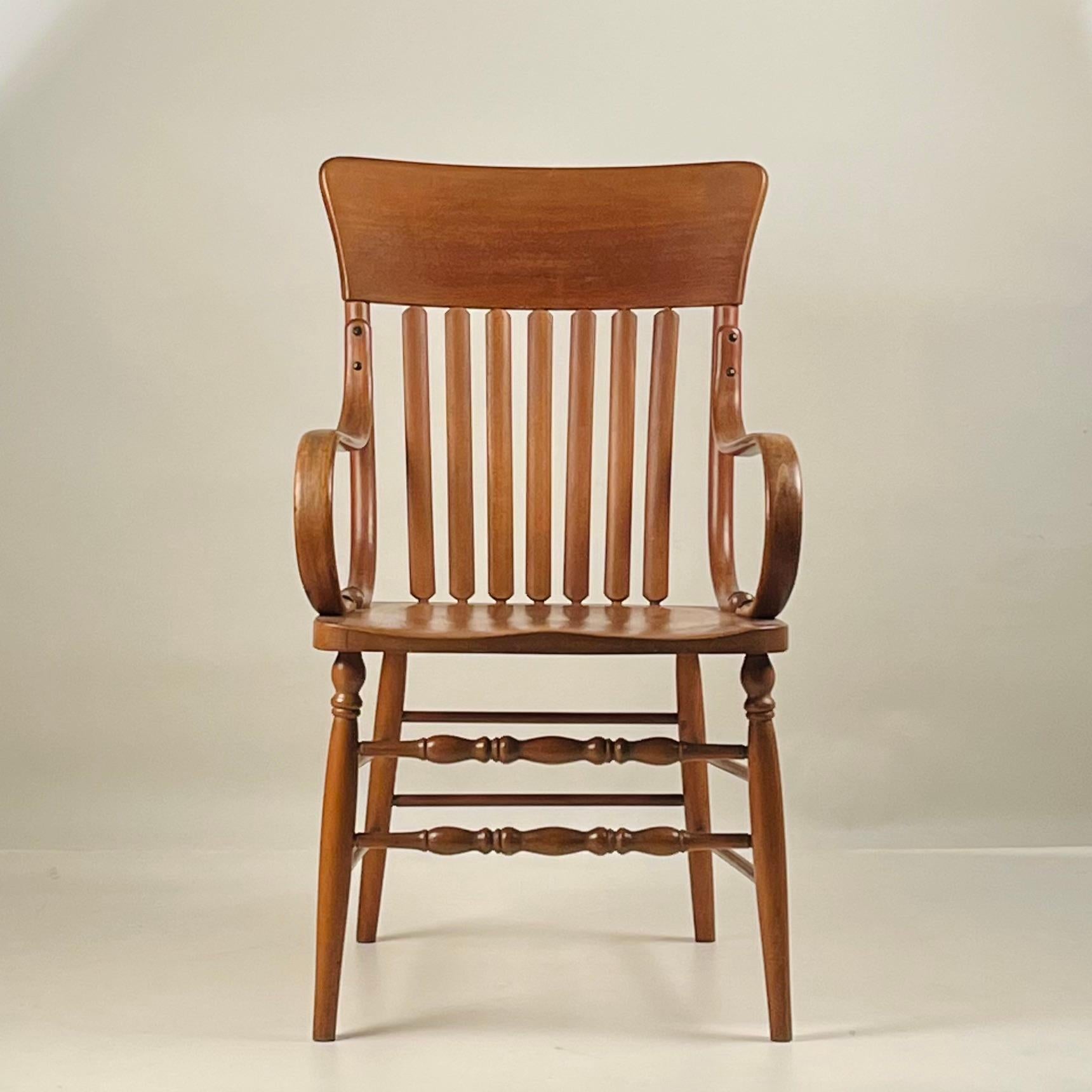 Large Arts & Crafts carved and polished oak armchair.

Impressive proportions.

