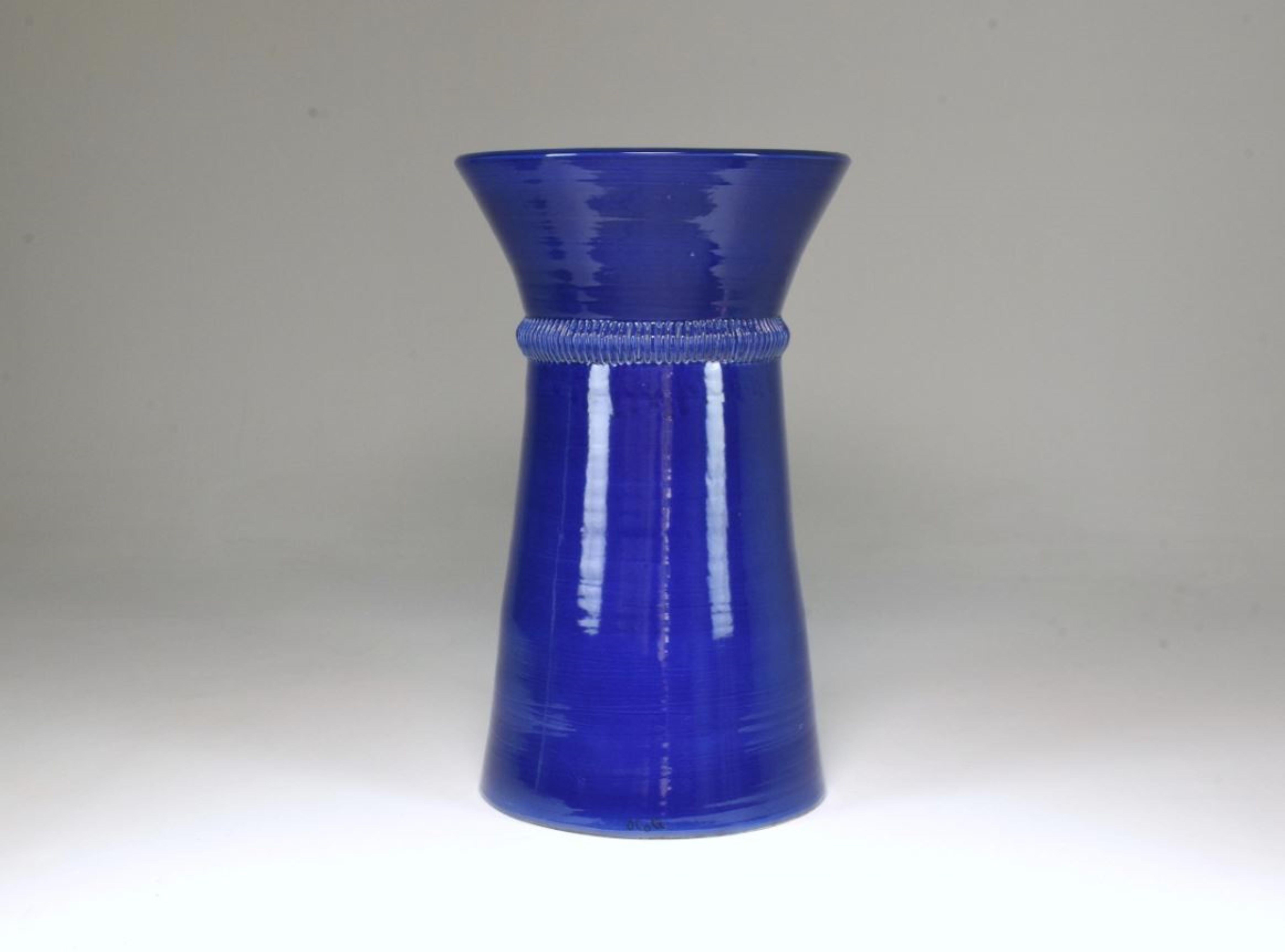 An oversize sustainably handcrafted vase vessel or jar in enameled ceramic with beautifully sculpted details.
Measures: H:69cm
D:40cm
Colors: blue, green or red.
