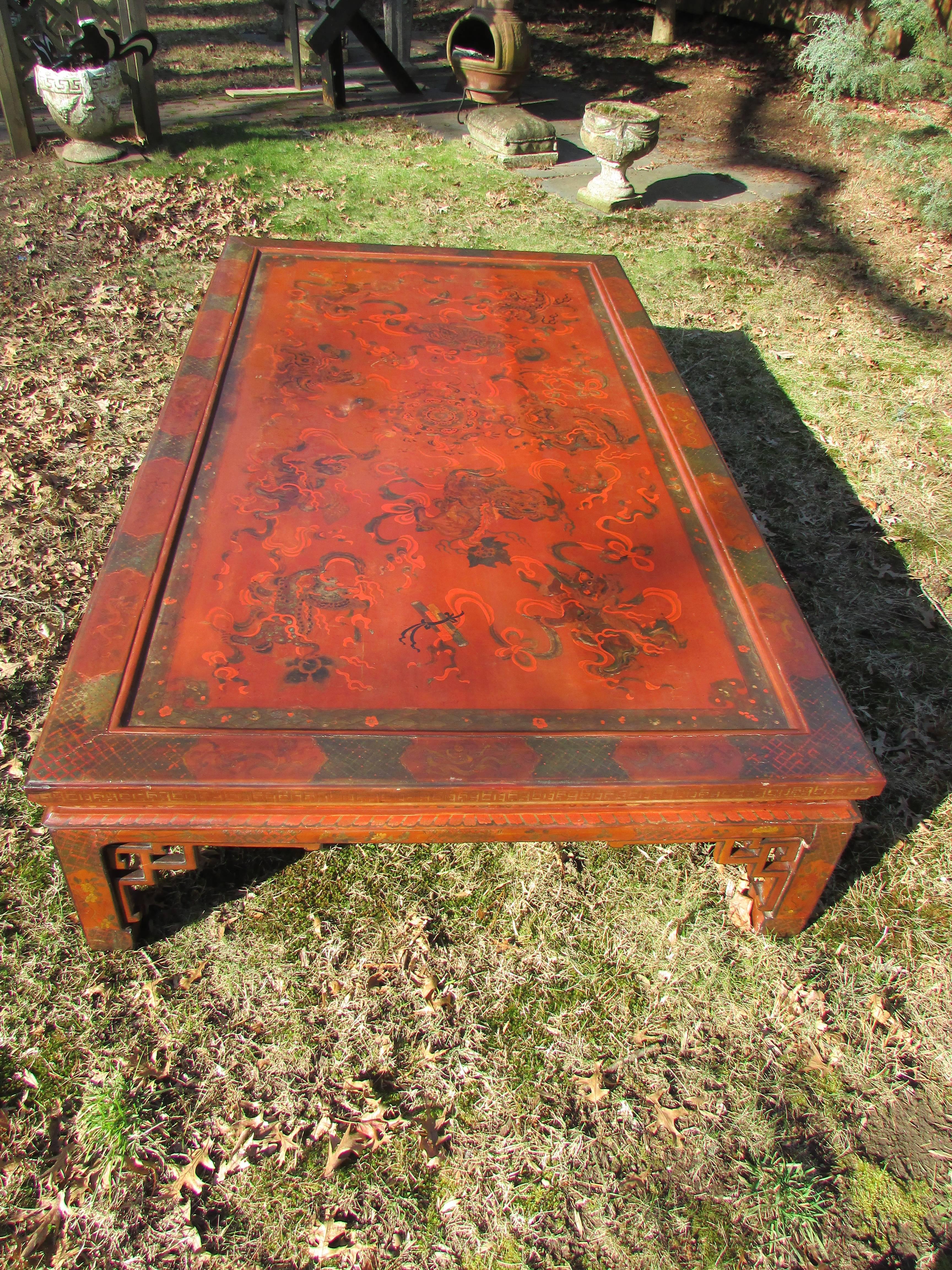 Large early 19th century Chinese lacquer hardwood table. The rare oversize scale in antique condition. Minor losses to lacquer surface with an old restoration to stabilize the frame.