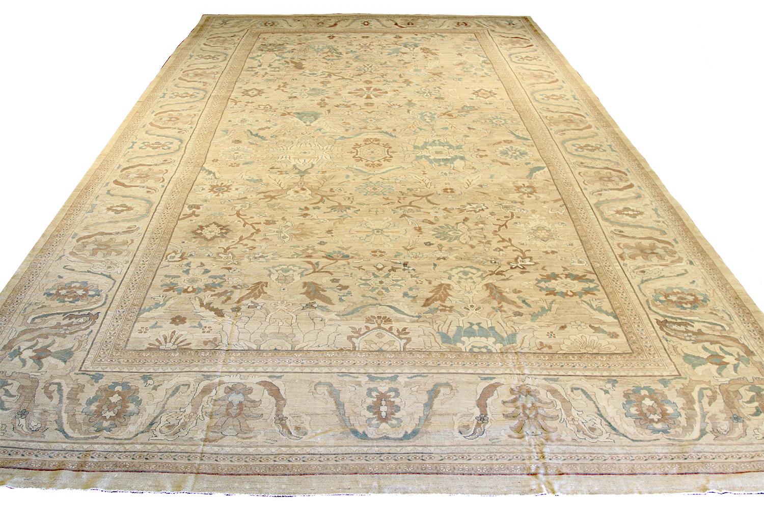 Oversize handmade Persian area rug from high-quality sheep’s wool and colored with eco-friendly vegetable dyes that are proven safe for humans and pets alike. It’s a classic Sultanabad design showcasing a regal ivory field with prominent Herati