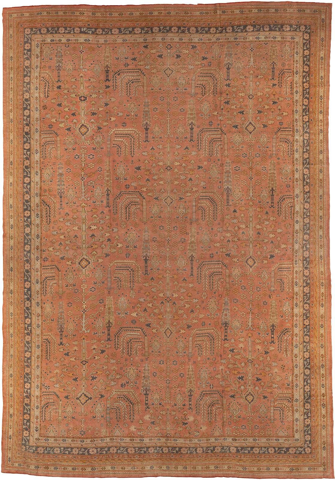 Phenomenal large size handmade Turkish Oushak in muted colors featururing an all over cypress/ willow tree design 

Measures: 14'9'' x 21'1''

Oushak rugs originated in the small town of Oushak in west-central Anatolia, today just south of Istanbul,