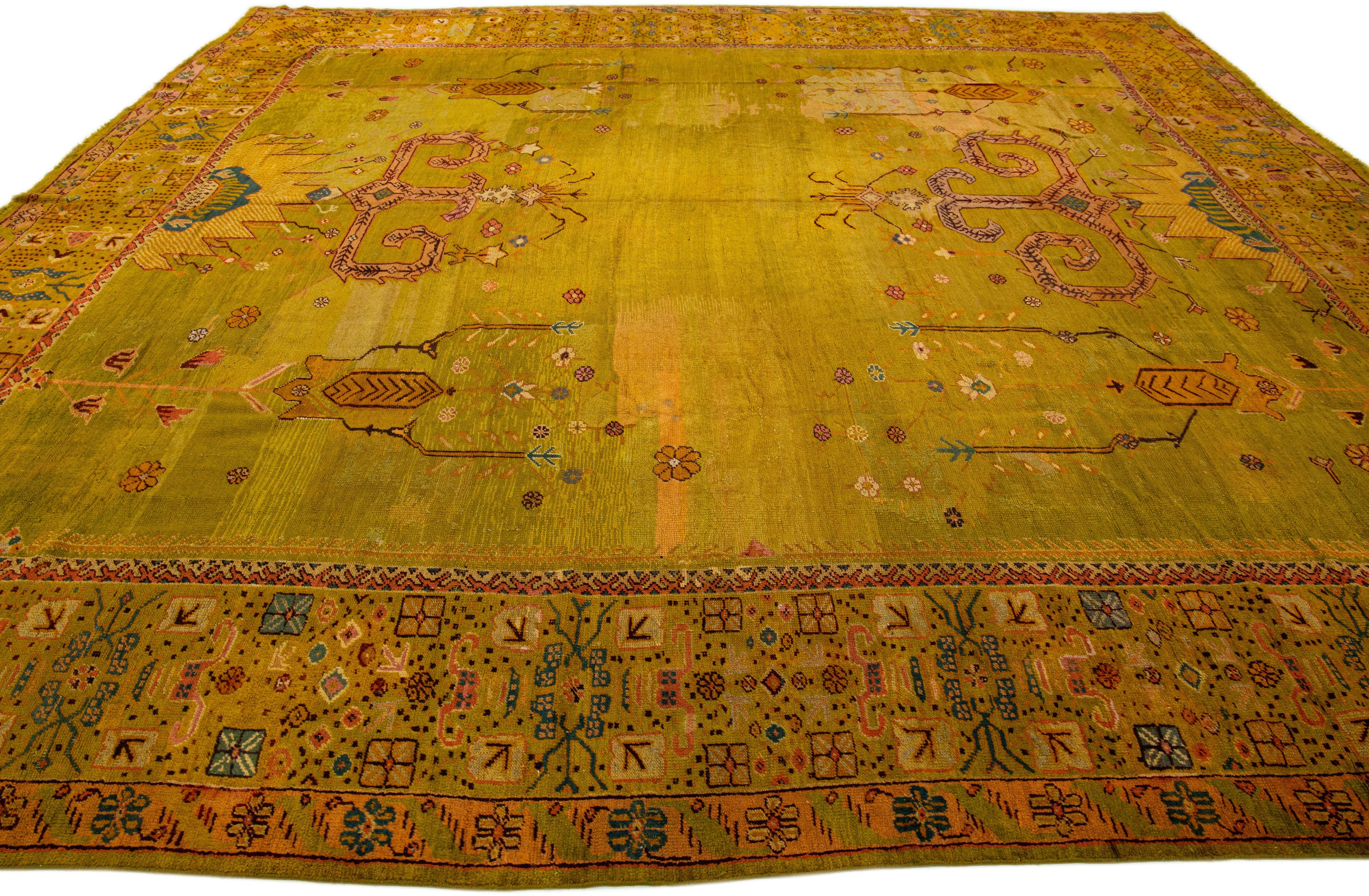 Oversize Designed 19th Century Turkish Oushak Wool Rug with Olive Yellow Field In Excellent Condition For Sale In Norwalk, CT