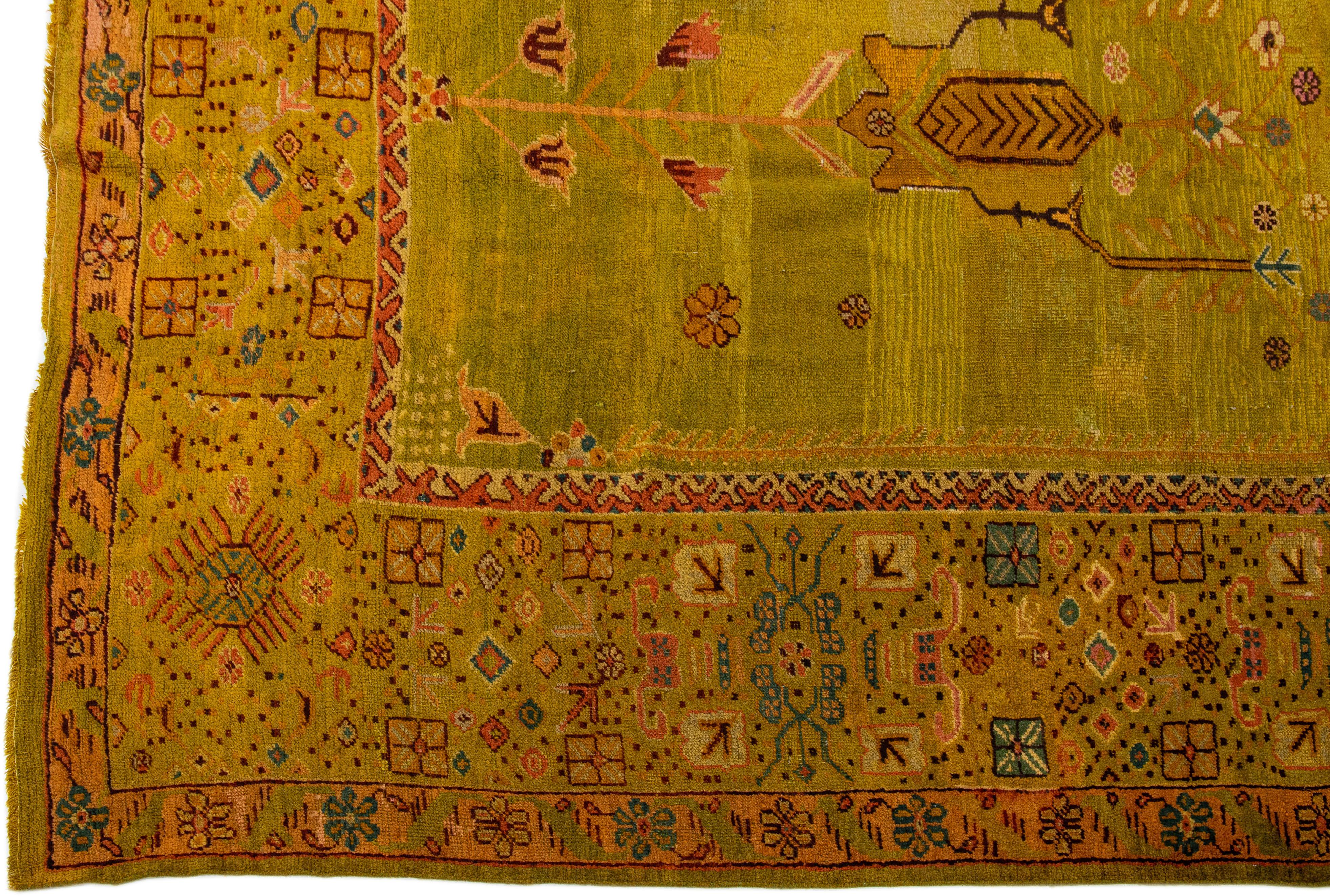 Late 19th Century Oversize Designed 19th Century Turkish Oushak Wool Rug with Olive Yellow Field For Sale