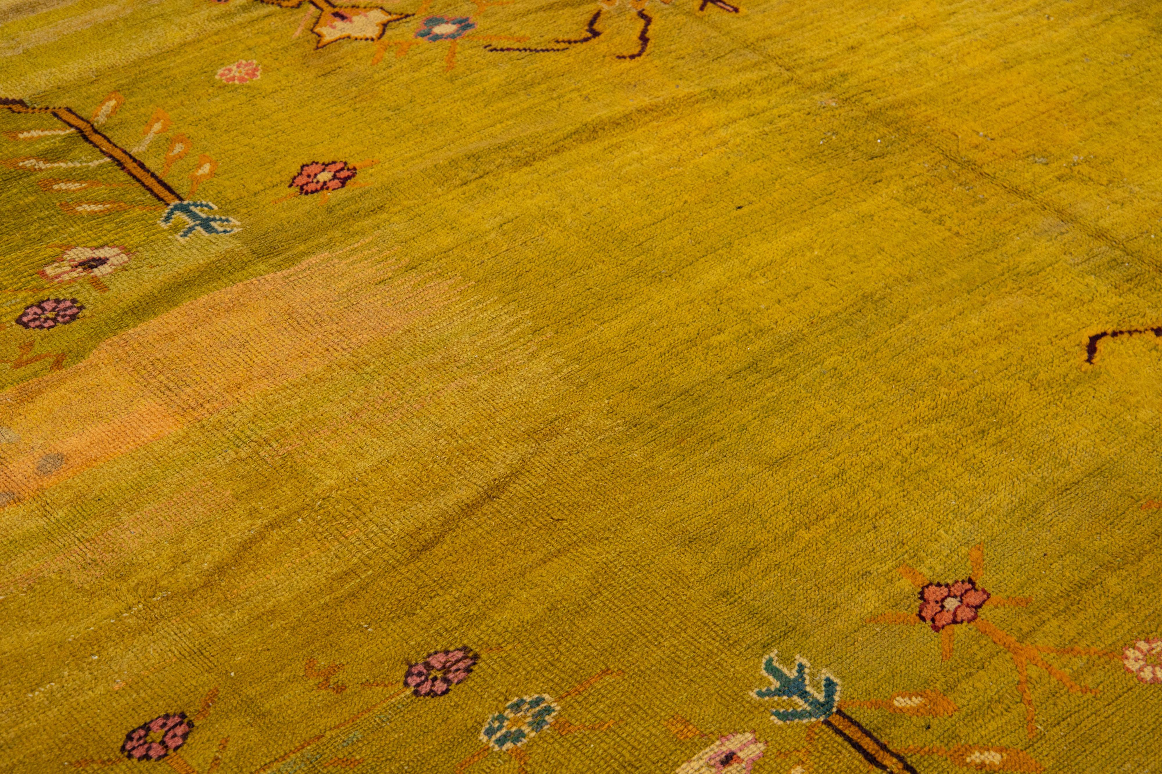 Oversize Designed 19th Century Turkish Oushak Wool Rug with Olive Yellow Field For Sale 1