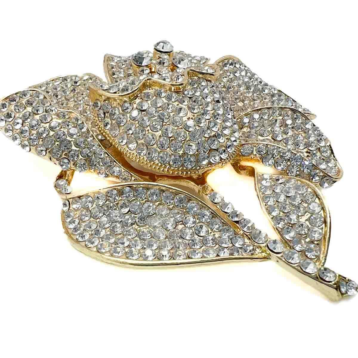 A spectacular Oversize Crystal Flower Brooch. Not for the faint hearted, this beauty will certainly wow and sparkle.
An unsigned beauty. A rare treasure. Just because a jewel doesn’t carry a designer name, doesn’t mean it isn't coveted. The unsigned