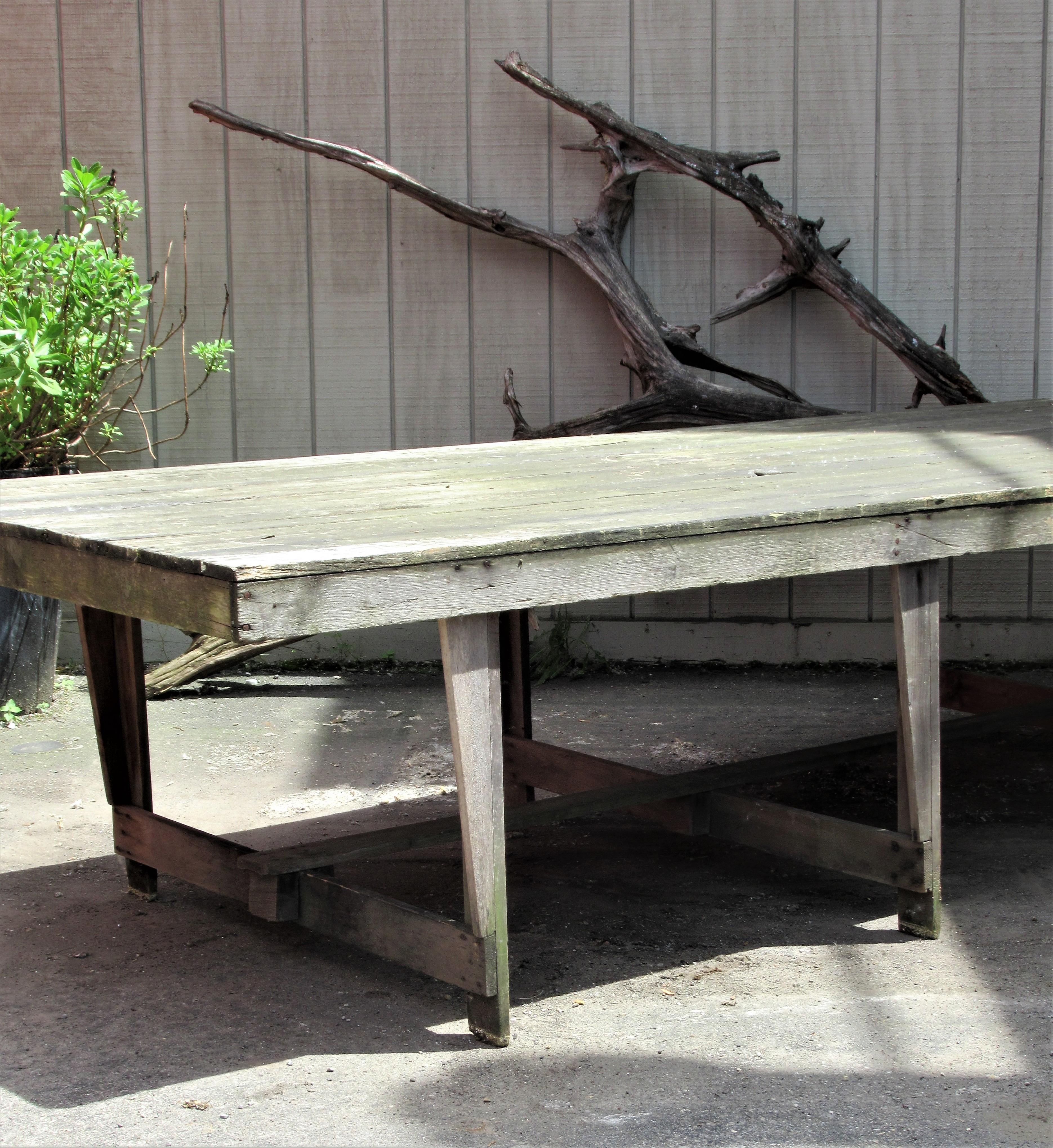 Very large old collapsible leg rustic style camp table in beautifully aged gray weathered surface. Great for dining, serving, display, the list goes on. American, circa 1940s. Look at all pictures and read condition report in comment section.
