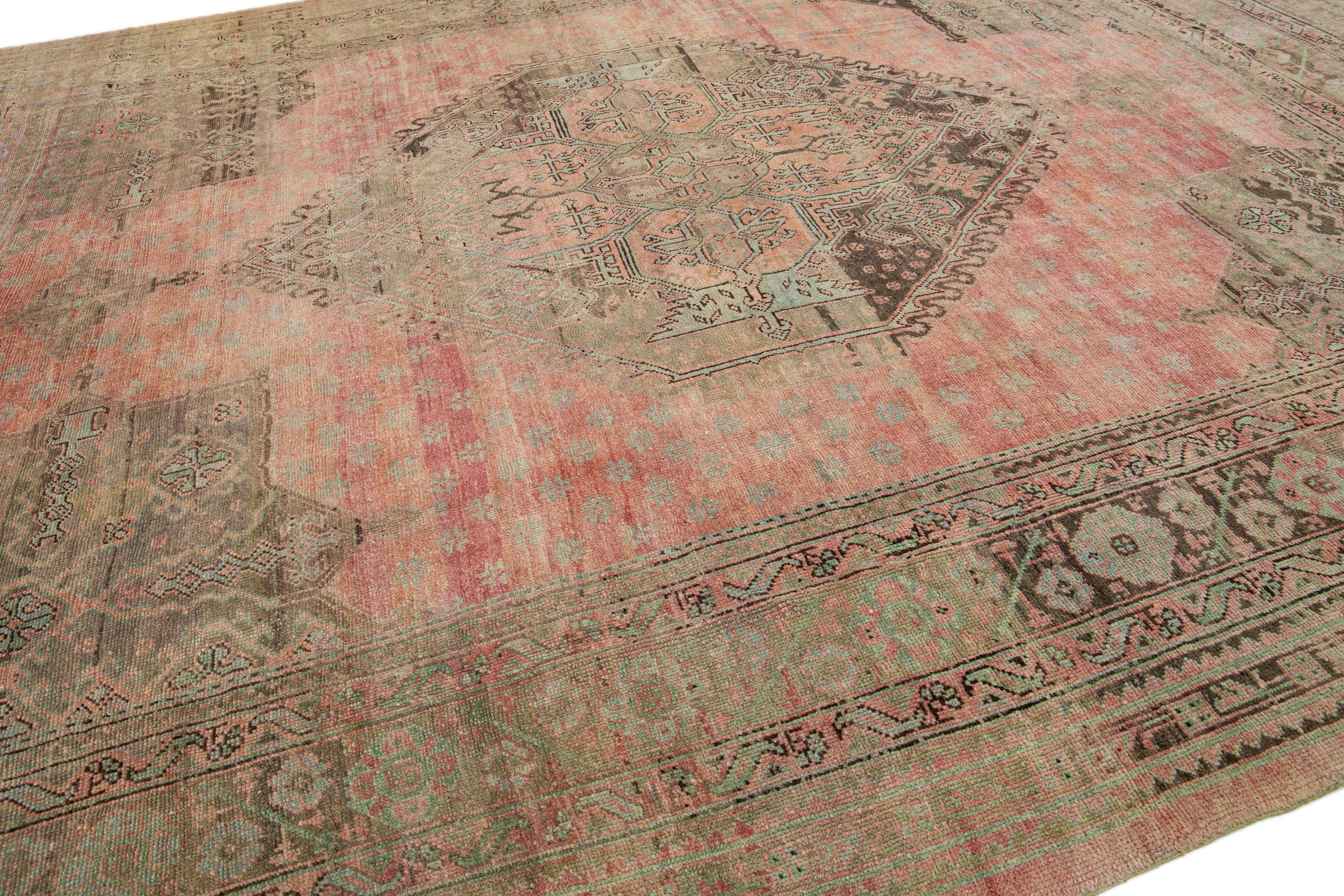 Oversize Handmade Antique Turkish Oushak Wool Rug in Rose Color In Good Condition For Sale In Norwalk, CT