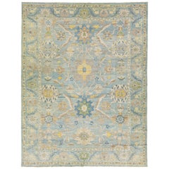 Tapis surdimensionné en laine florale Sultanabad fait à la main en bleu