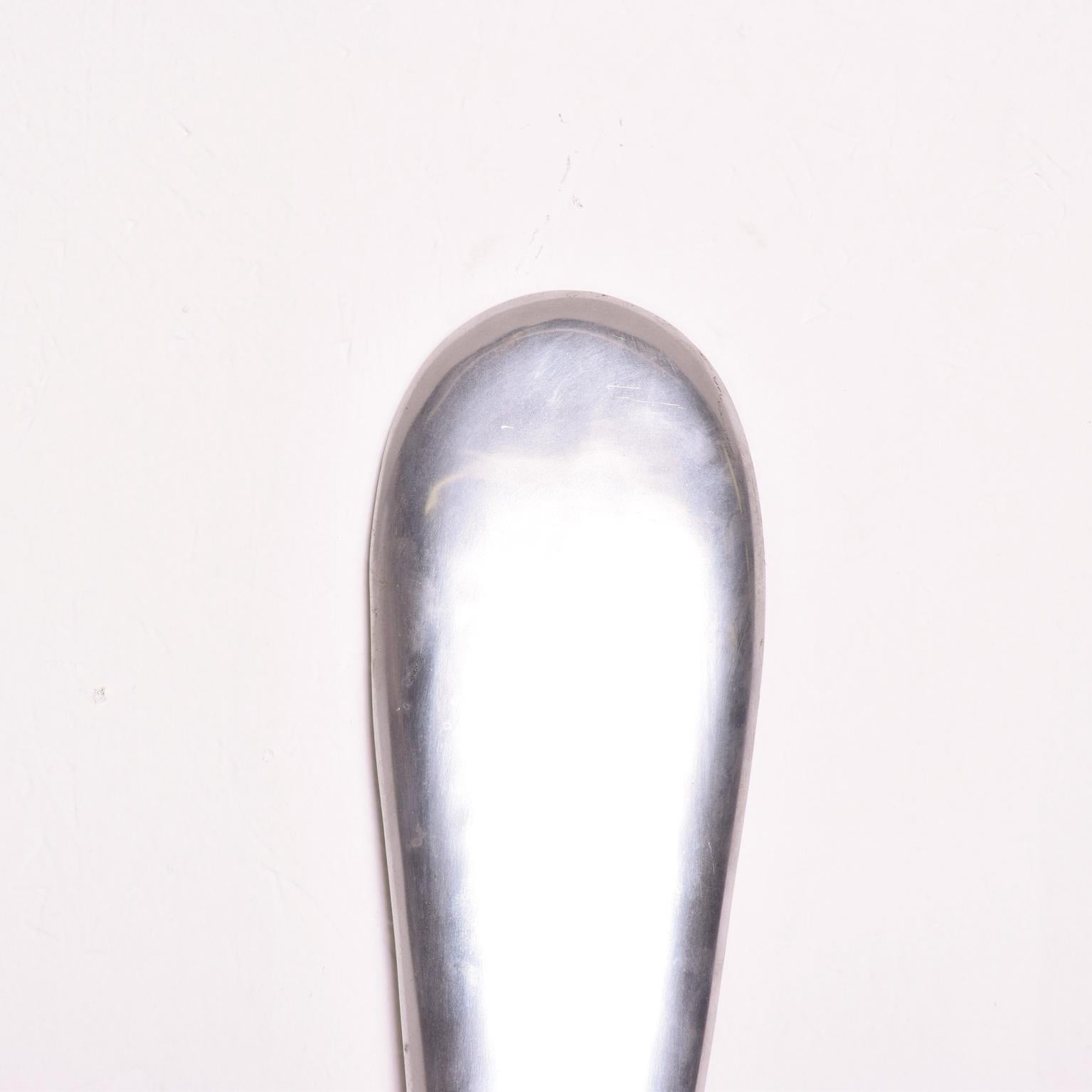 We are pleased to offer for your consideration an oversized aluminum spoon sculpture. Attributed to C Jere. Not signed or label present from the maker. Made in the USA, circa 1970s. The spoon can be hung into the wall. Dimensions: 46 1/2