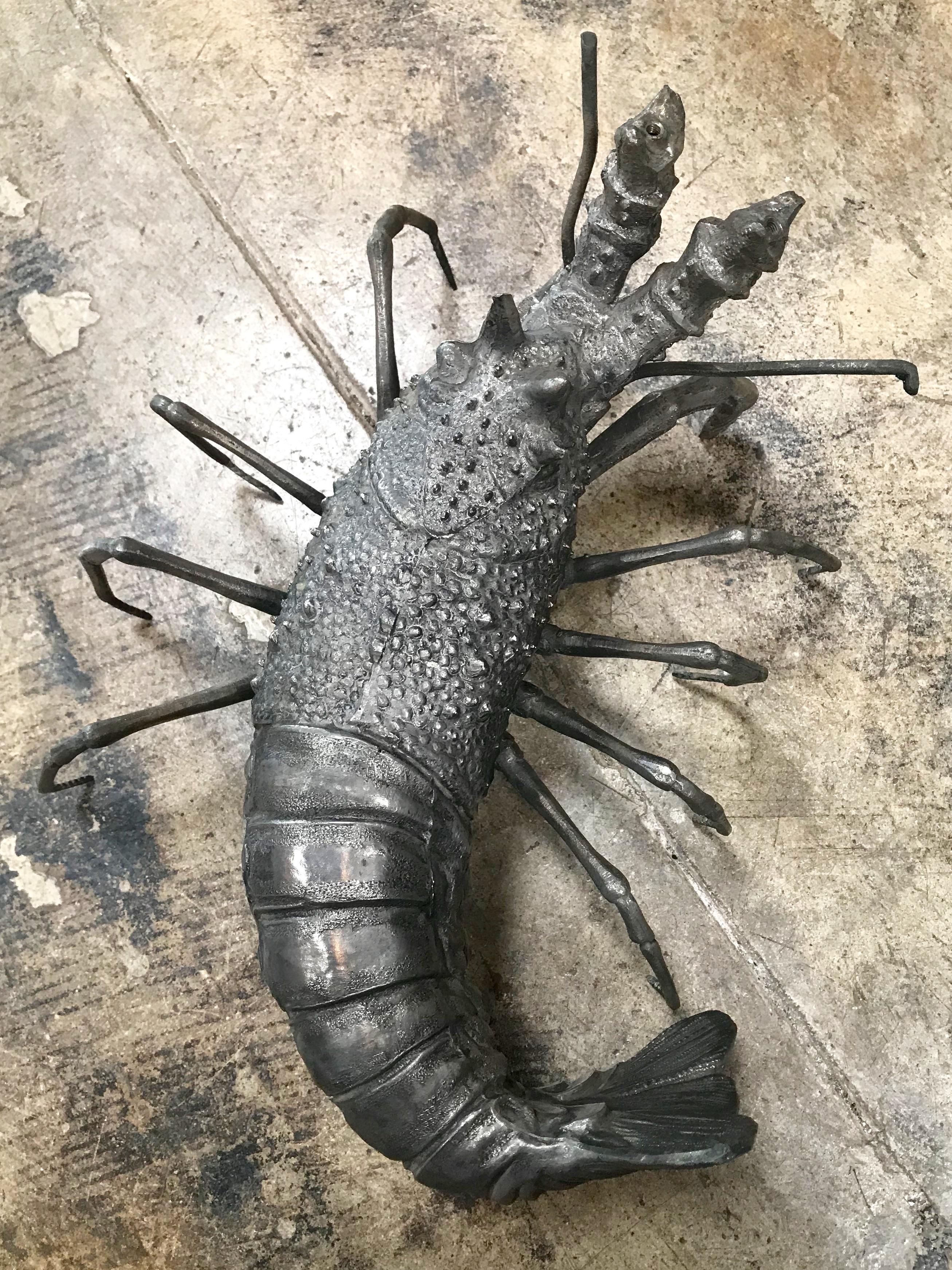 Oversize lobster sculpture in pewter.
The perfect sculpture for a seafood lover.
It has excellent patina and is a definite centrepiece of the room.
High quality of handcrafted in this rare object.
Signed 