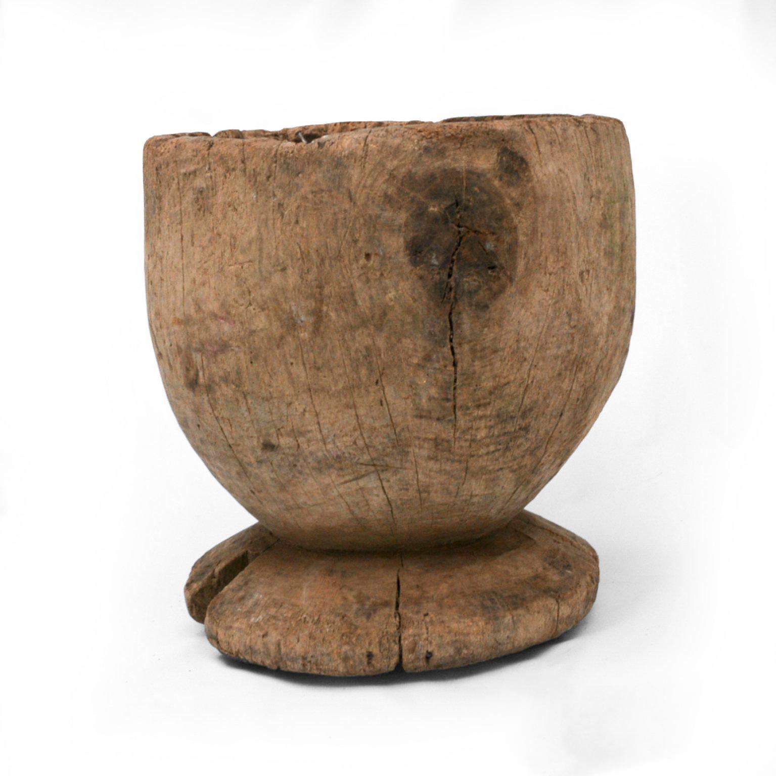 For your consideration an antique wood mortar constructed of one single block of wood. 
Original unrestored condition. 

Vintage patina present. Cracks and stains present. 

Sabino wood from the region of Oaxaca Mexico. 
No marking present