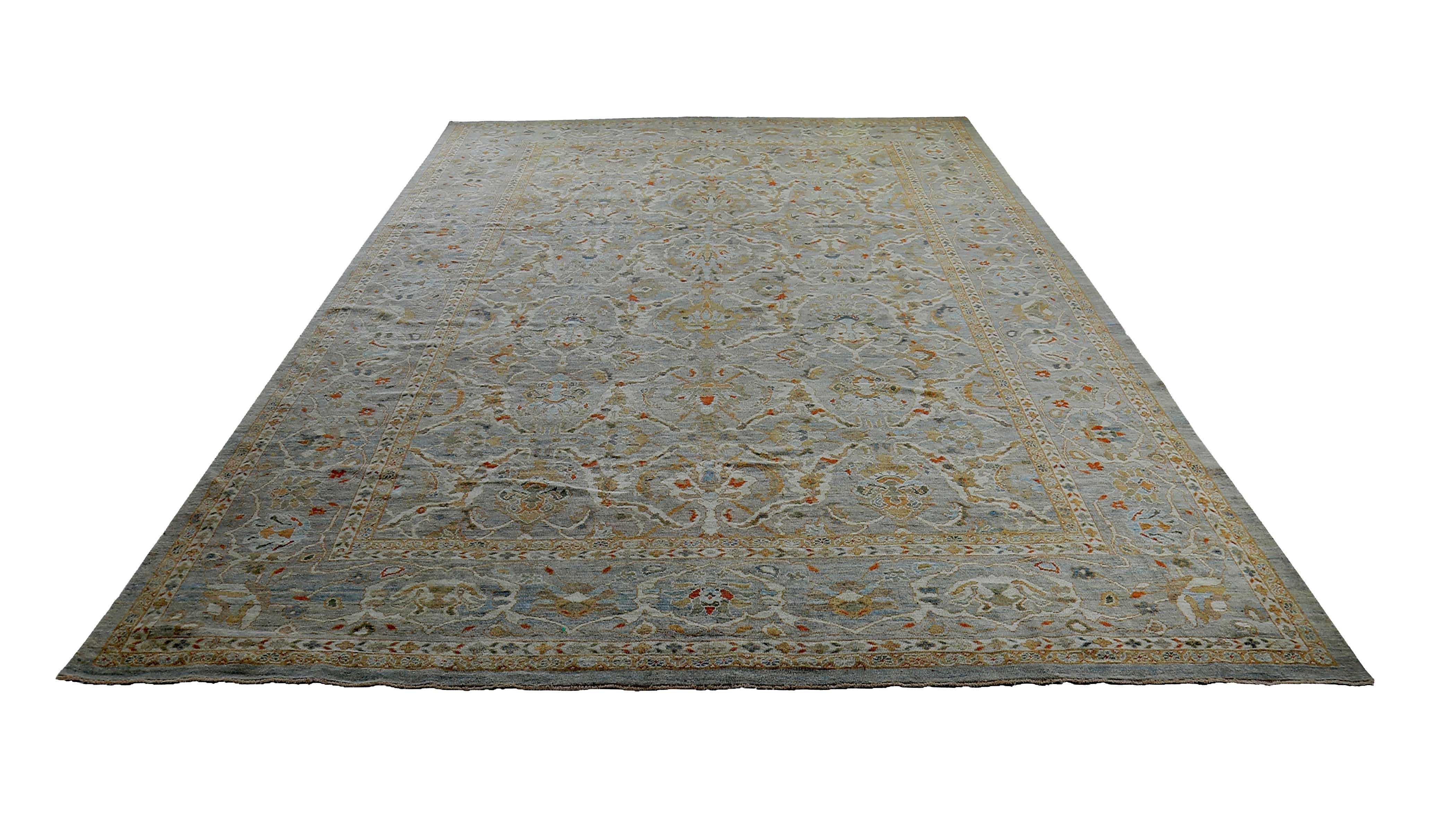 New handmade Turkish rug from high quality sheep’s wool and colored with eco-friendly vegetable dyes that are proven safe for humans and pets alike. It’s a classic Sultanabad design showcasing a lovely gray field with prominent Herati flower heads