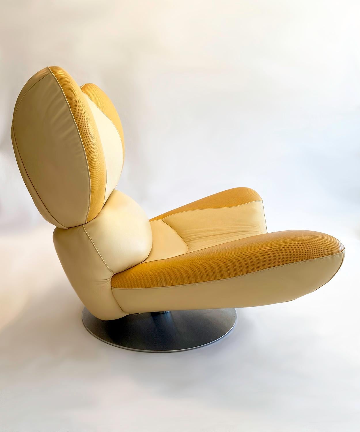 Oversize two-color leather swivel lounge chair 'Frog' by Poltromec, 1980s. Sturdy, modern comfortable organic-style full grain leather over a wood frame with a brushed aluminum swivel base. Butter-color and sunflower leather. Designed by Daniel