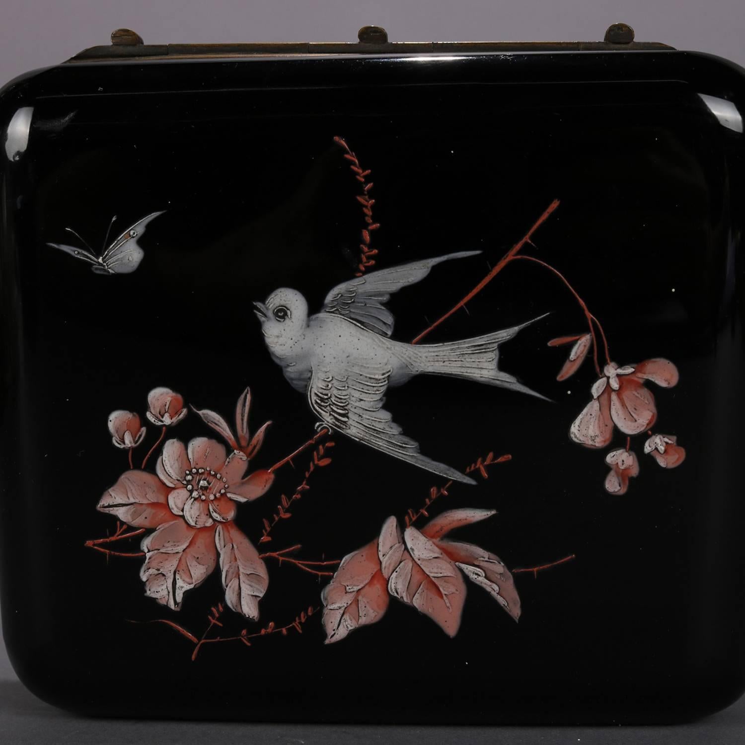Oversized Victorian amethyst glass dresser jewelry box features hand-painted enamel sparrows in floral setting and has gilt cast bronze mounts including floral garland handles and scrolled feet with Jenny Lind masks, circa 1890.

Measures: 4.5