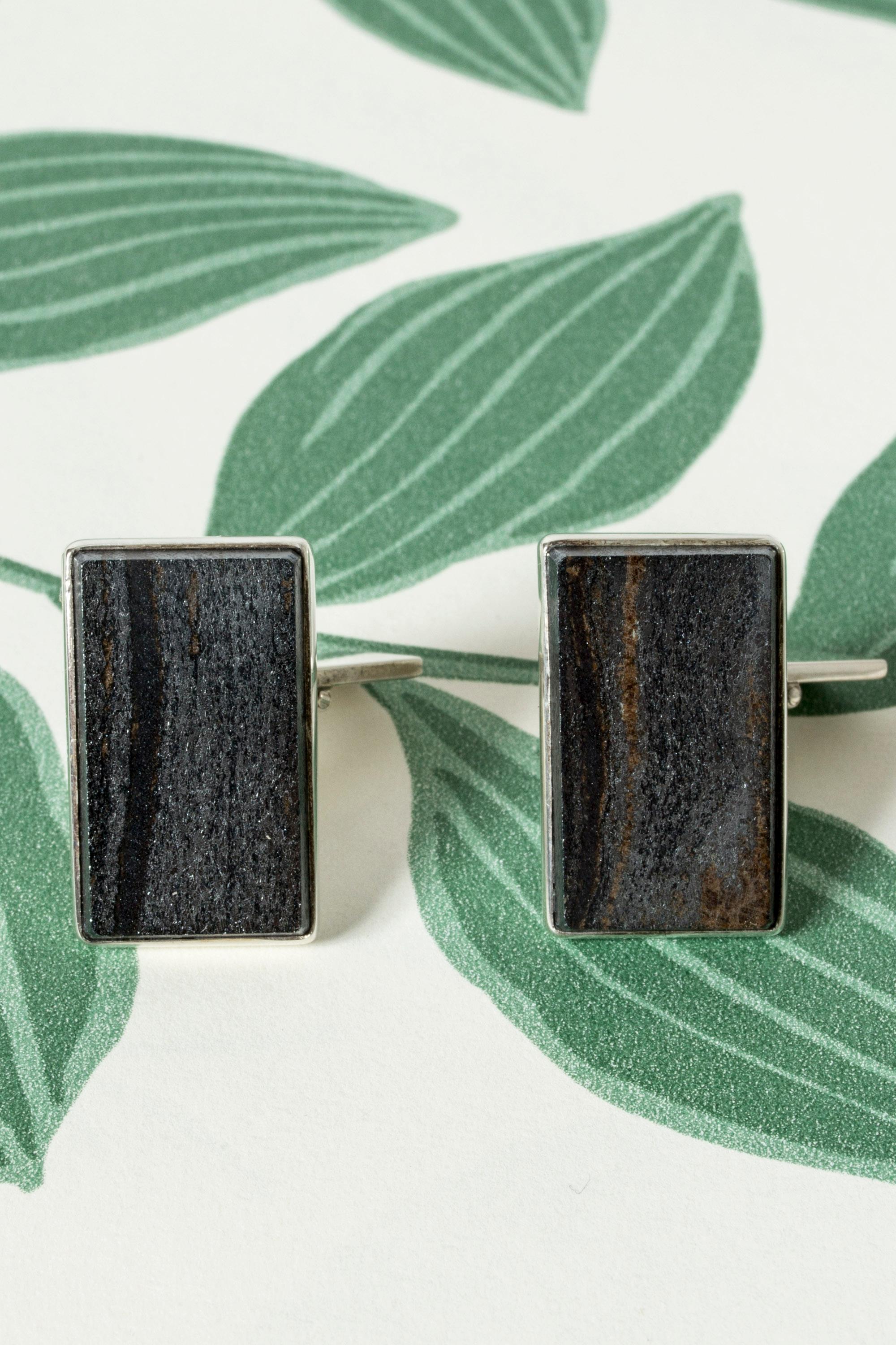 Cool silver cufflinks by Sten Morssing, in an oversized design with large hematite stones. Nice sheen and variation of color in the stones.