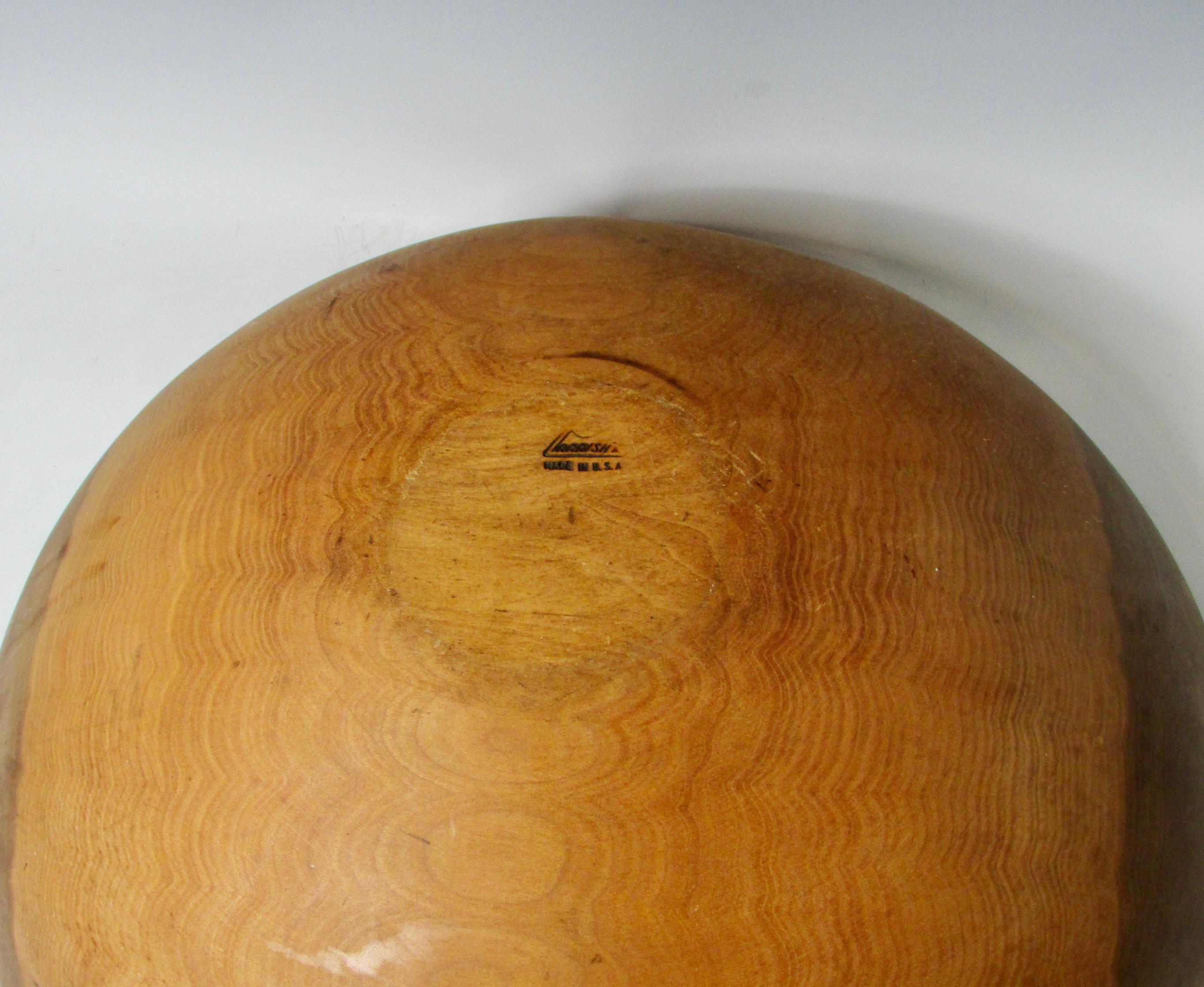 Carved Oversize Wooden Bowl in Walnut Branded Parrish For Sale