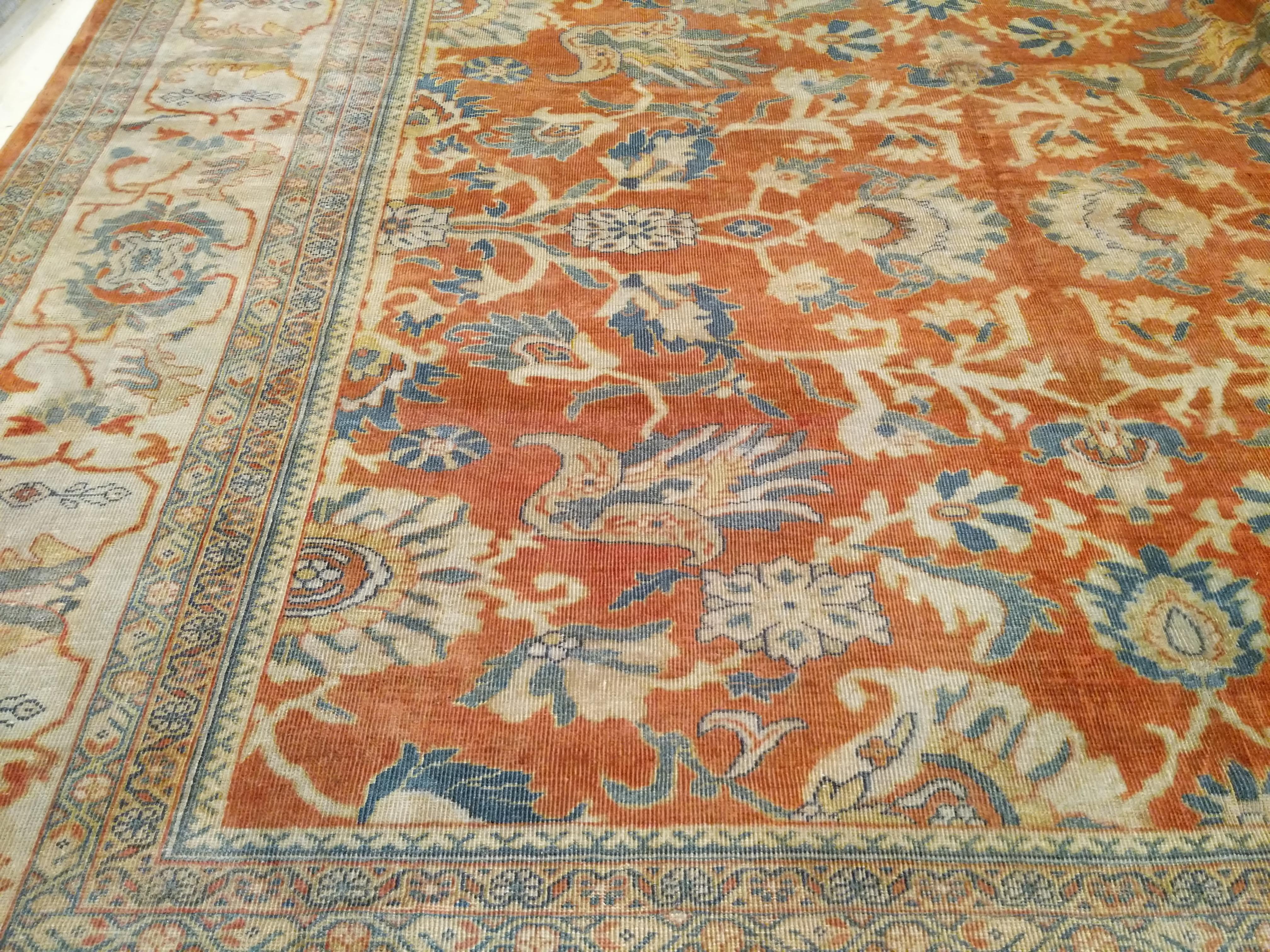 A majestic looking Ziegler style carpet which was commissioned over two decades ago by a client of mine for the living room of his manor. Because it had to match other antique Zieglers in his collection, much effort was put in order to reproduce the