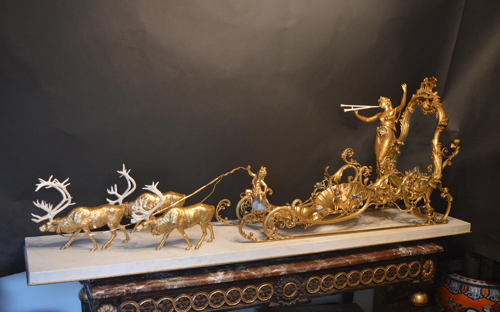 19th century Italian, guild bronze sculpture placed on a marble base. Details on the sculpture are in bone, champleve, and onyx. There are two signatures, one on the base of the woman playing the trumpet, and the fairy signed Euy (Eugene) Marioton.