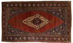 Oversized 19th Century Hand-Knotted Serapi Carpet in Rust and Indigo Wool