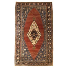 Oversized 19th Century Hand-Knotted Serapi Carpet in Rust and Indigo Wool