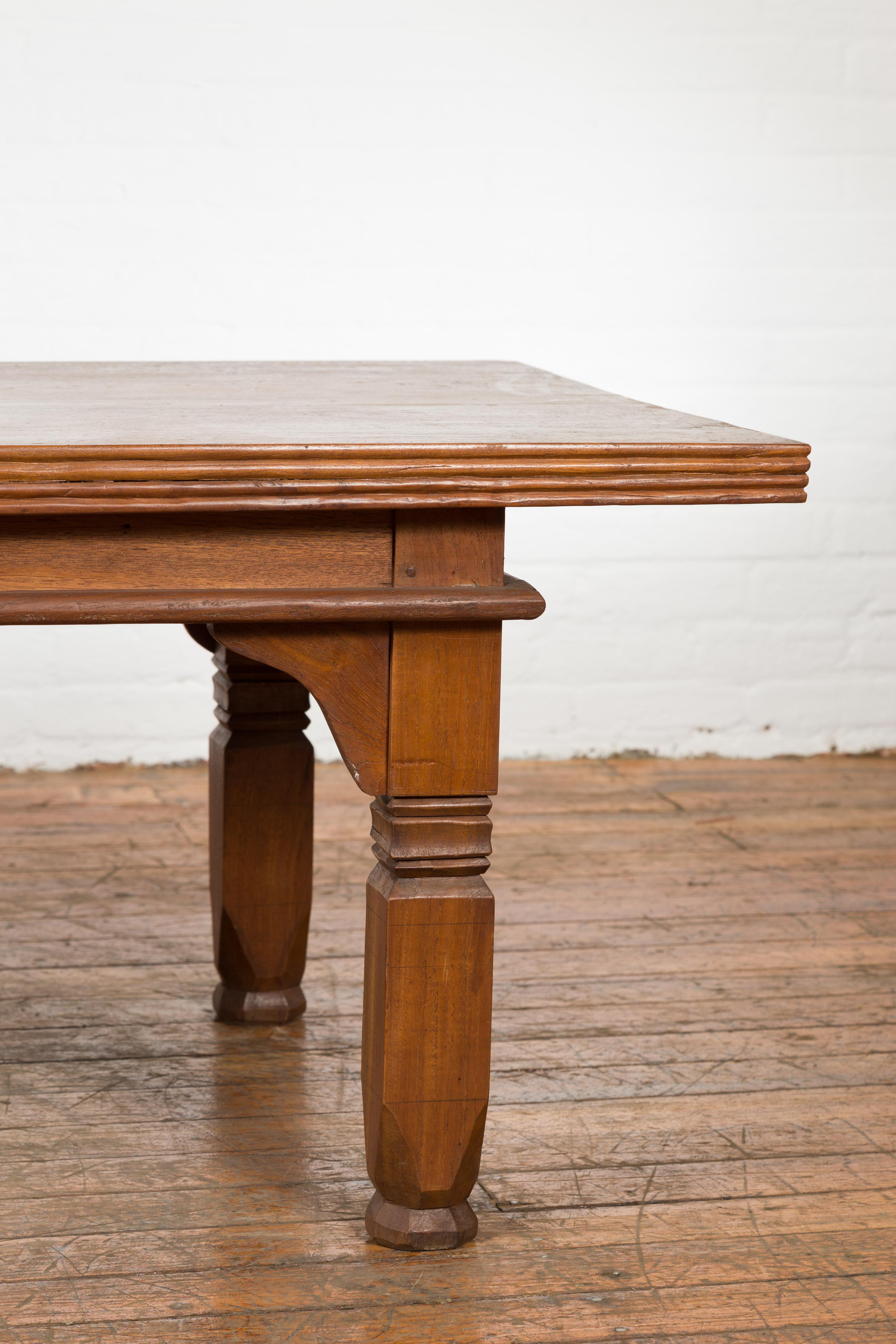 Oversized 19th Century Indonesian Coffee Table with Reeded Edge and Carved Legs In Good Condition For Sale In Yonkers, NY