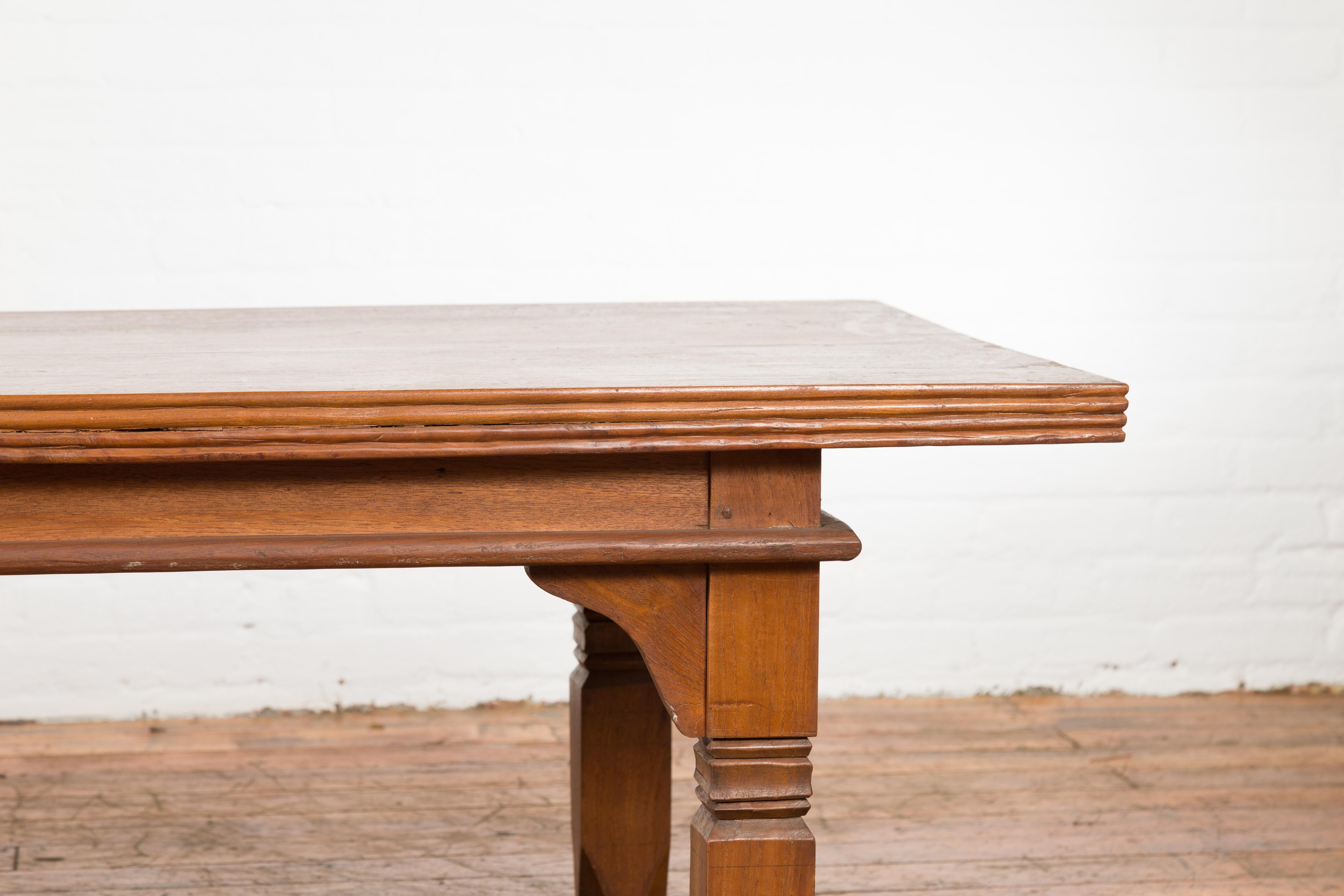 Wood Oversized 19th Century Indonesian Coffee Table with Reeded Edge and Carved Legs For Sale